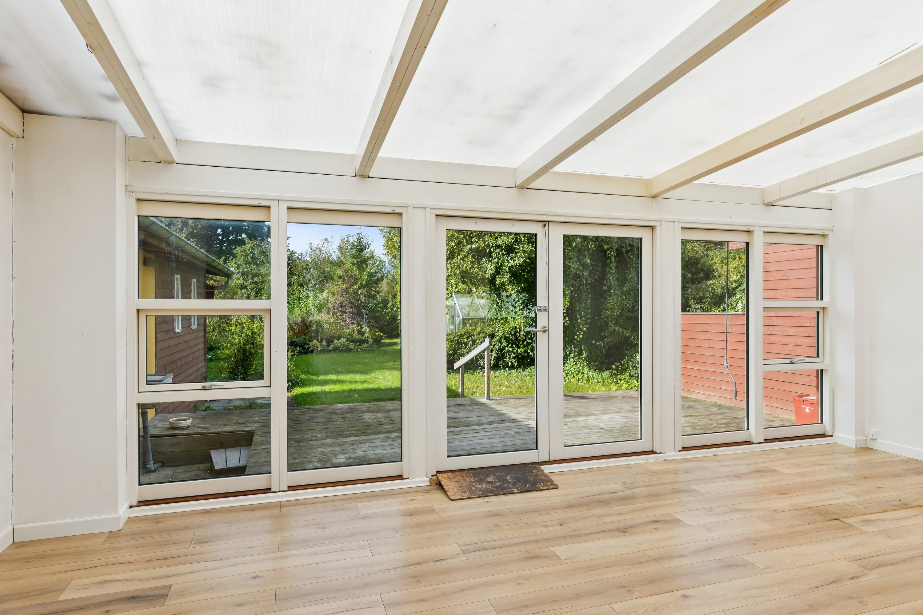 Fremhævet udestue billede i fuldskærmstilstand. Billede af Løvenborgvej 11, 4420 Regstrup