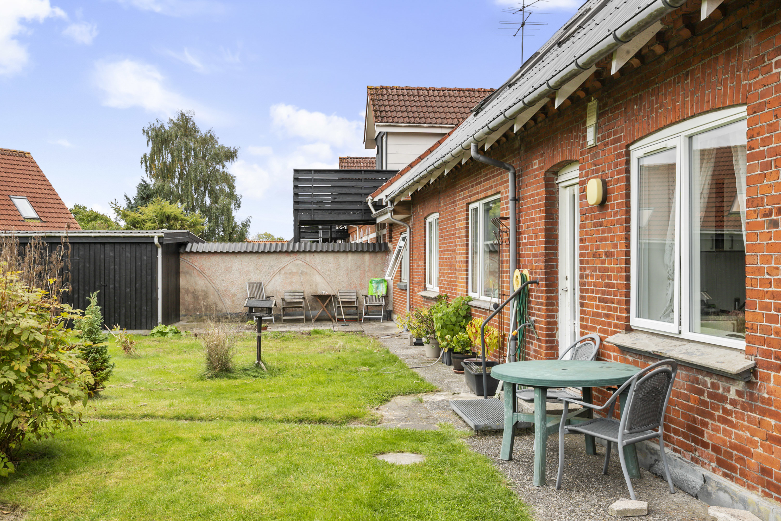 Fremhævet terrasse billede i fuldskærmstilstand. Billede af Vestbygade 7A-D, Haverslev, 9610 Nørager