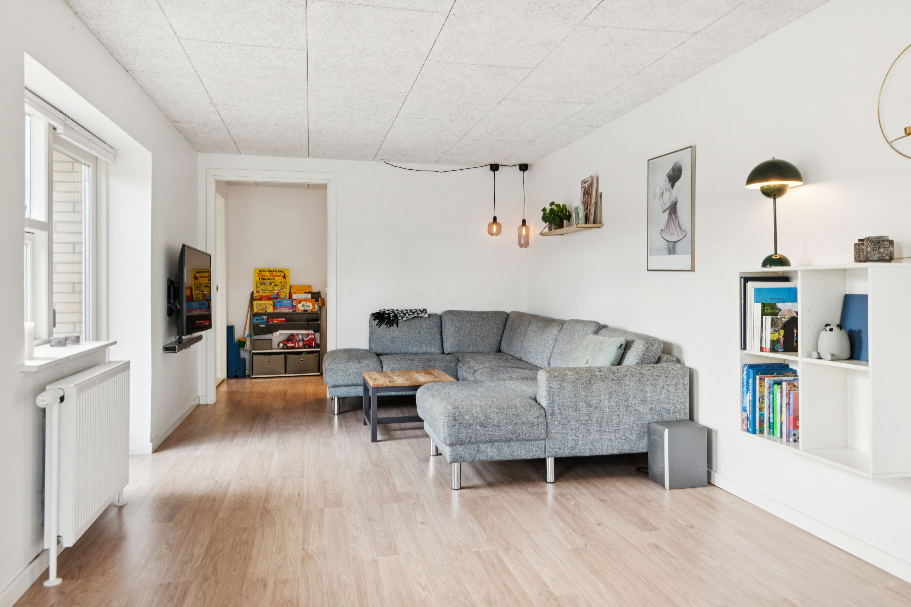 Fremhævet stue billede i fuldskærmstilstand. Billede af Drastrup Skovvej 31, 9200 Aalborg SV