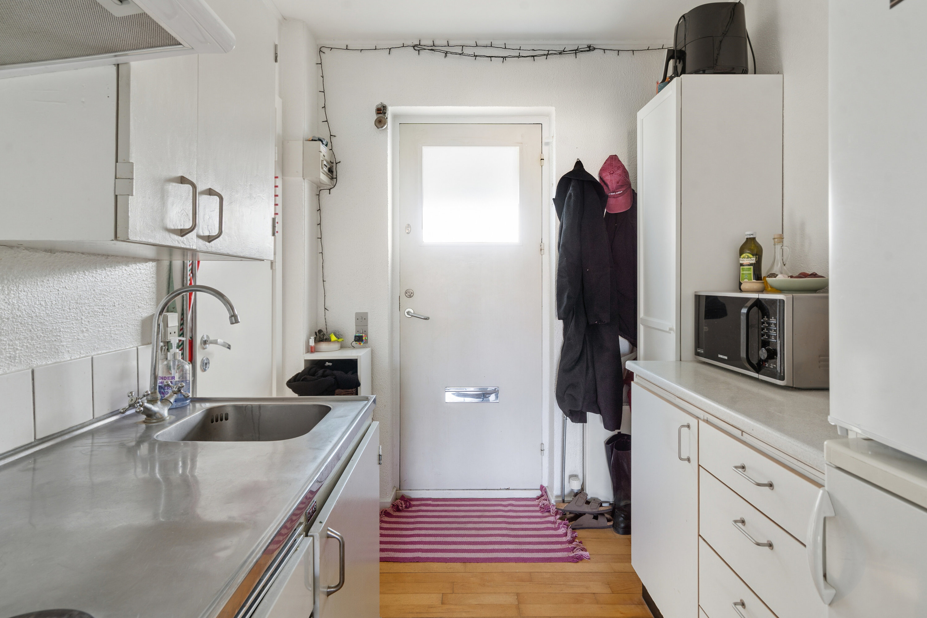 Fremhævet køkken billede i fuldskærmstilstand. Billede af Hverringevej 1, 1. 17., 5230 Odense M