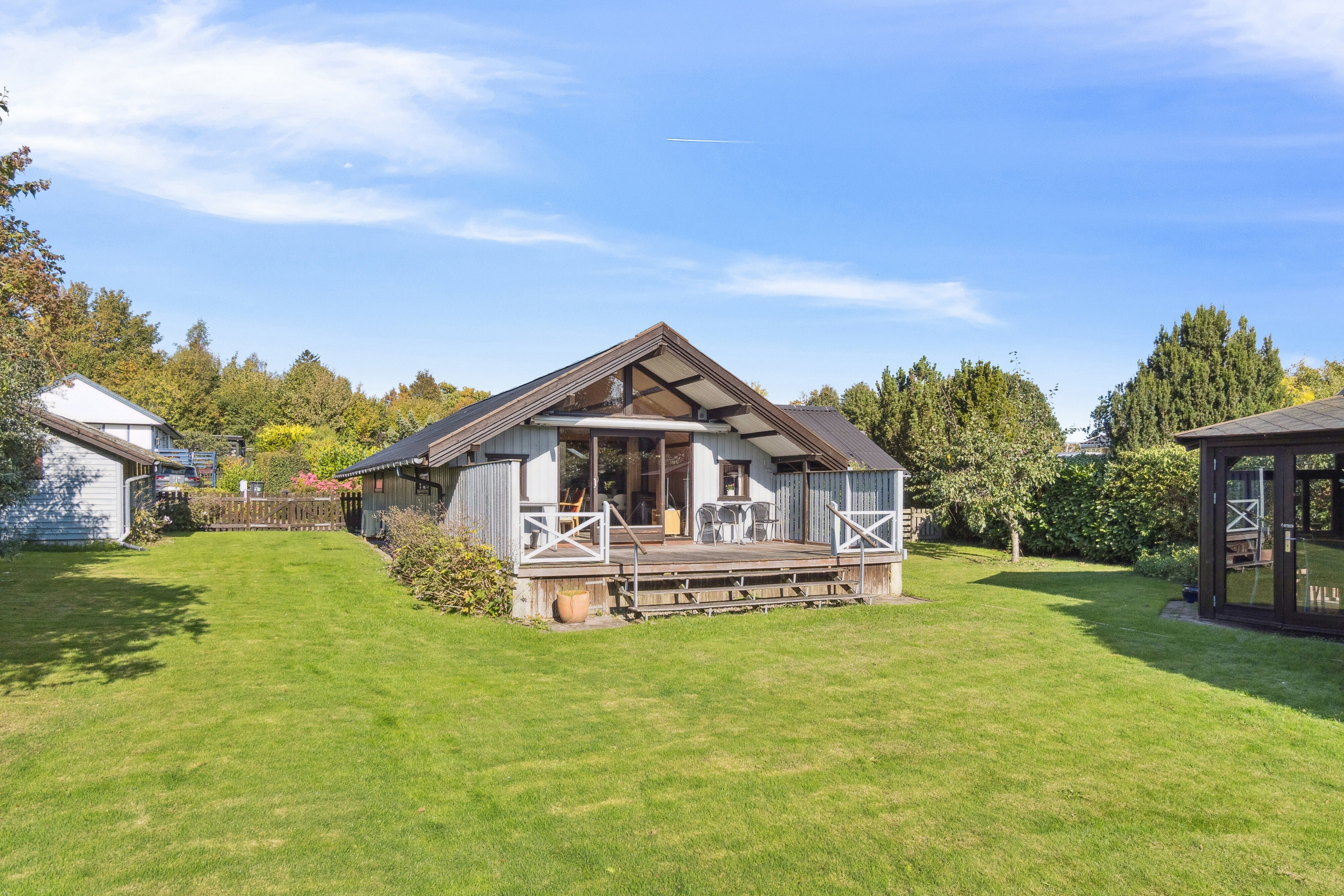 Fremhævet set fra haven billede i fuldskærmstilstand. Billede af Strandlystvej 32, Store Havelse Strand, 3310 Ølsted