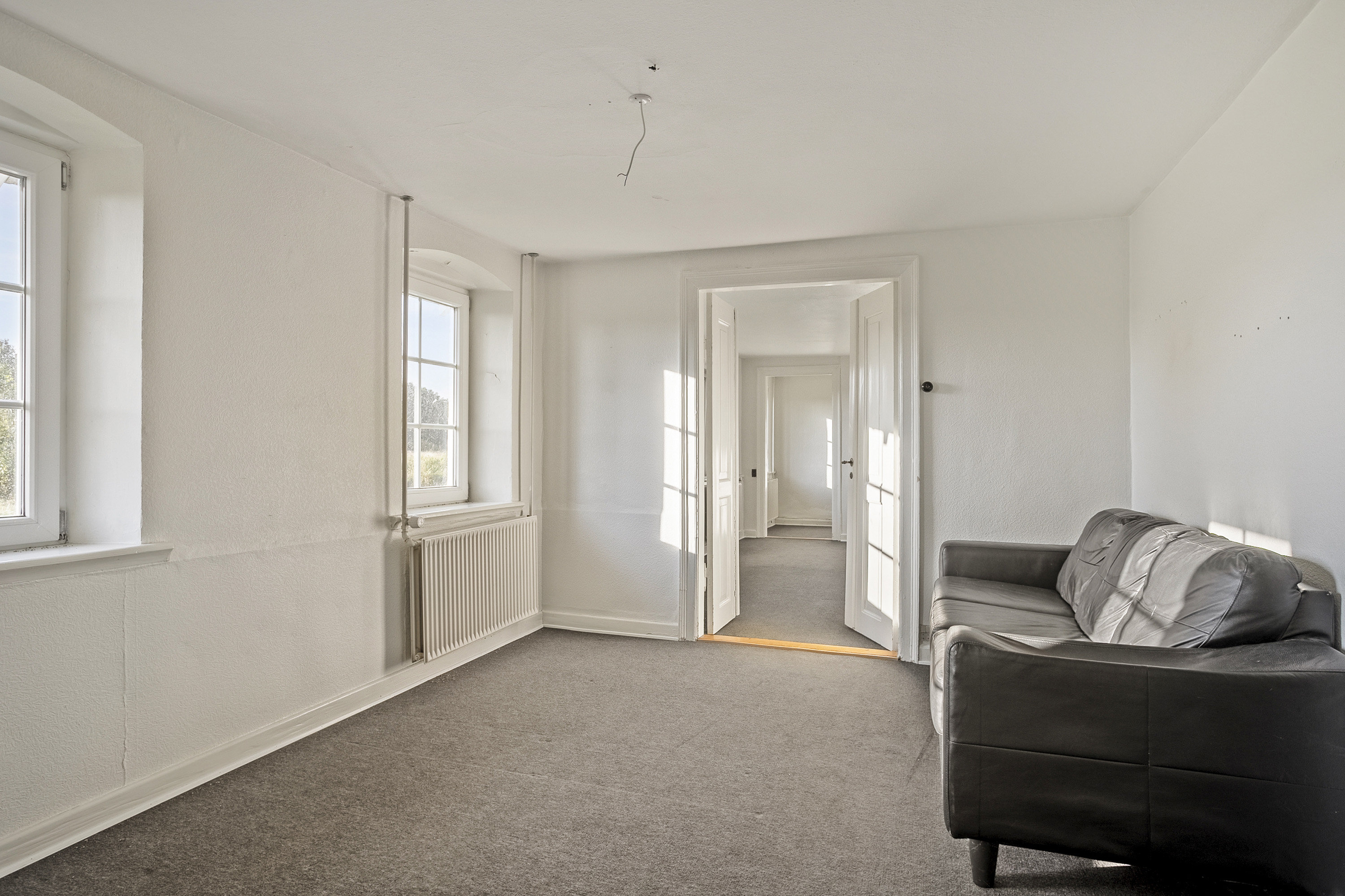 Fremhævet stue billede i fuldskærmstilstand. Billede af Møllevej 1, Gørklint, 6670 Holsted