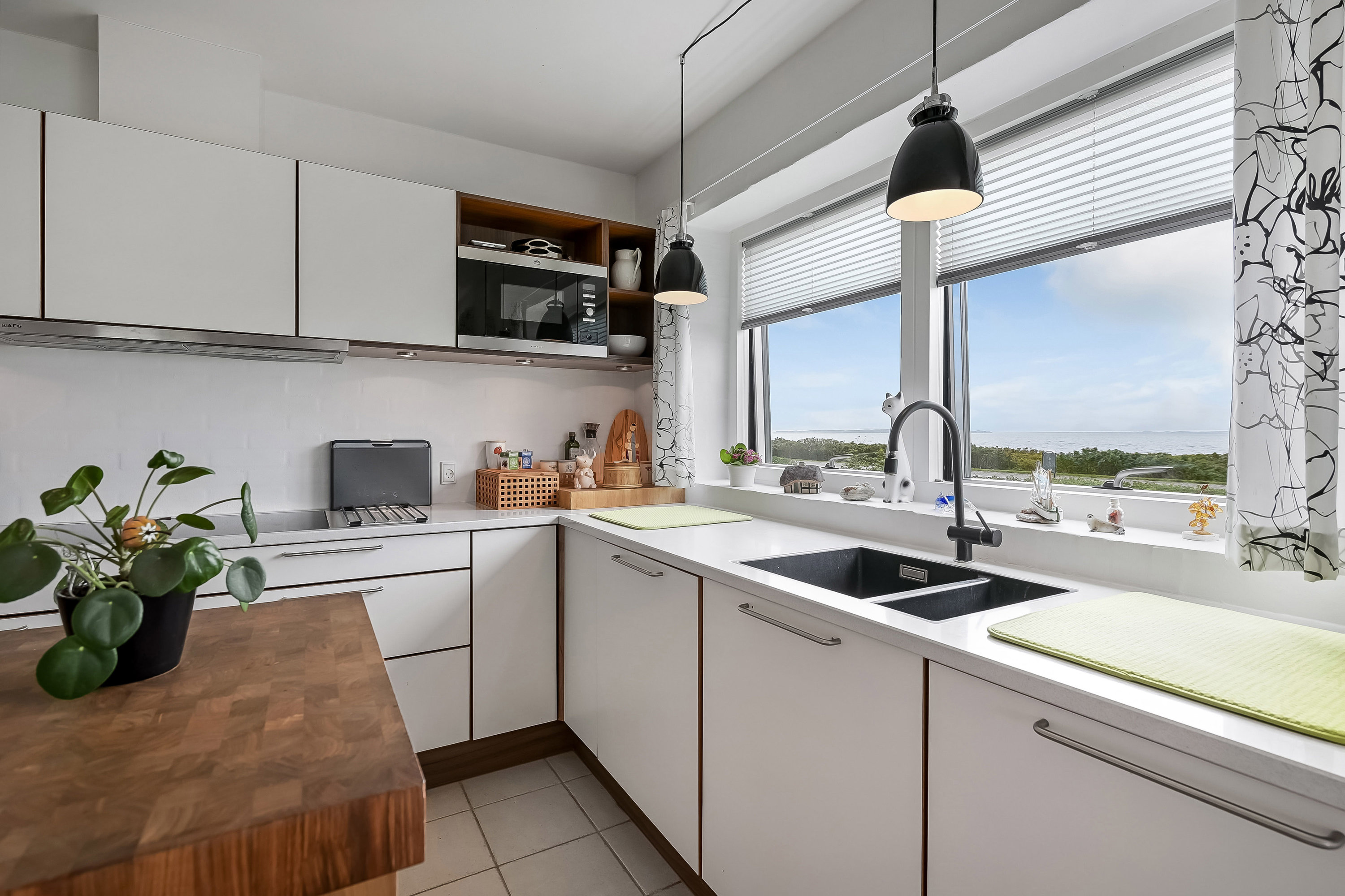 Fremhævet køkken billede i fuldskærmstilstand. Billede af Rønvej 21, Jegindø, 7790 Thyholm