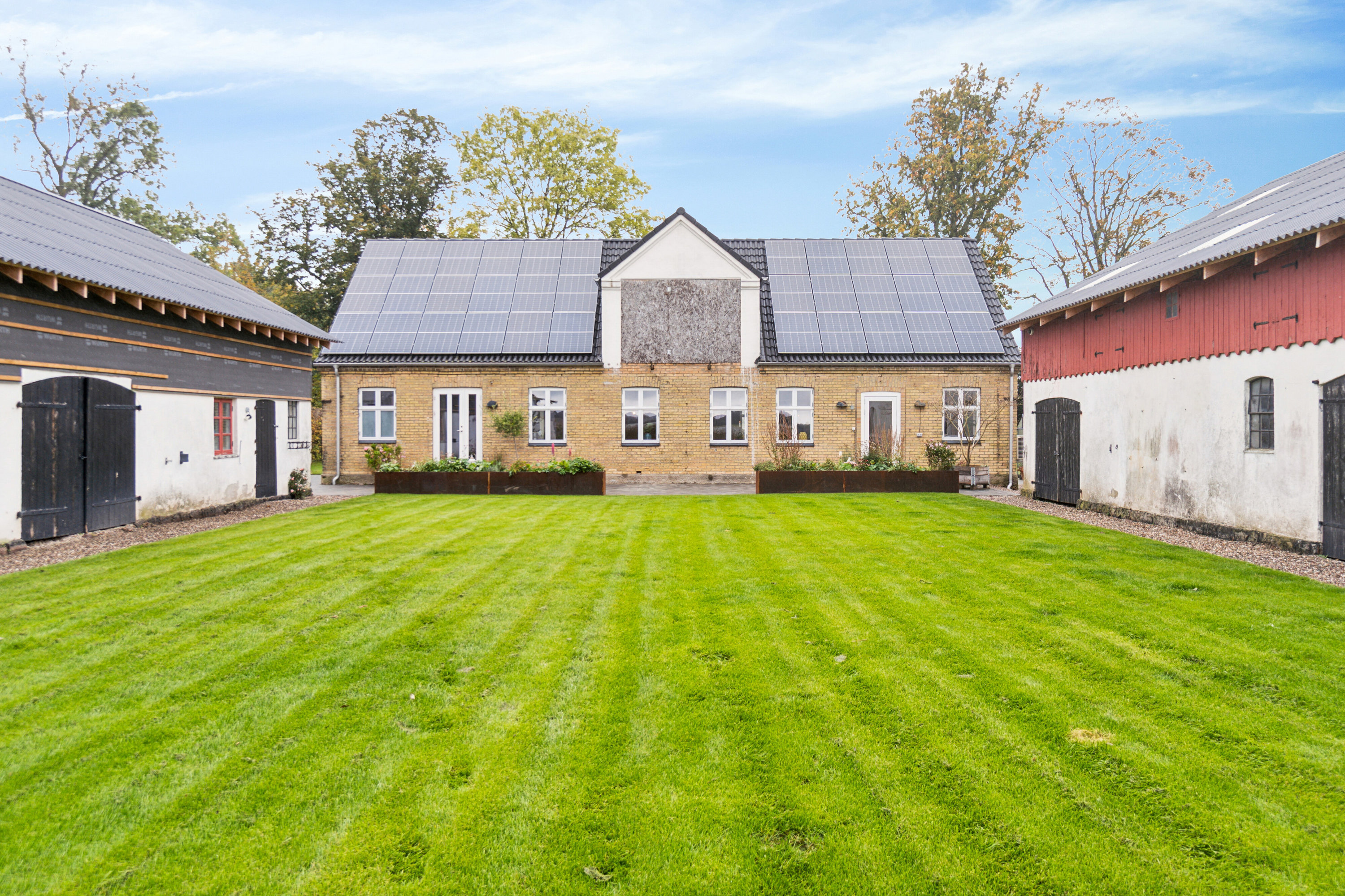 Fremhævet set fra haven billede i fuldskærmstilstand. Billede af Møllevej 40, Tornemark, 4262 Sandved