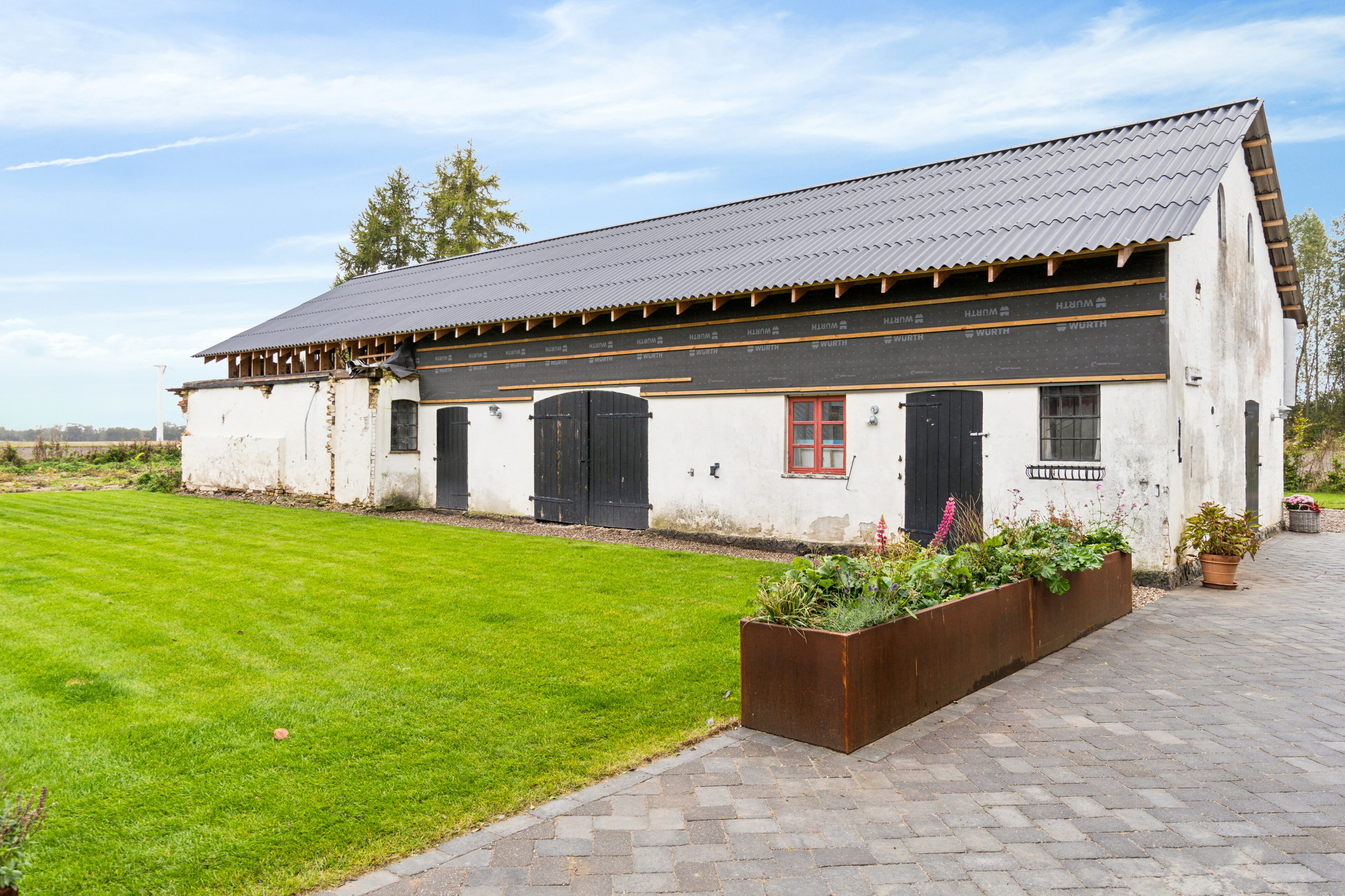 Fremhævet set fra haven billede i fuldskærmstilstand. Billede af Møllevej 40, Tornemark, 4262 Sandved