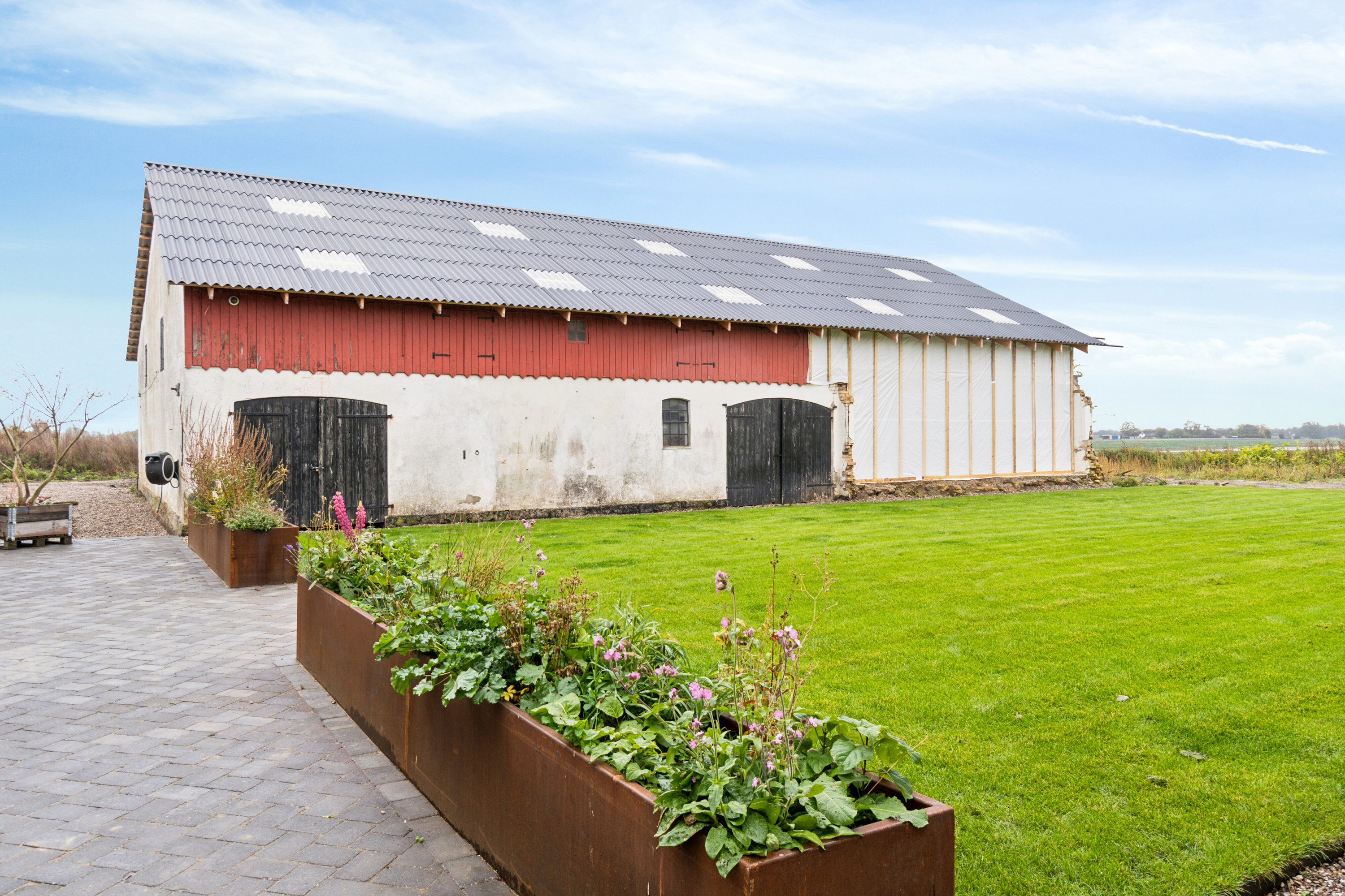 Fremhævet set fra haven billede i fuldskærmstilstand. Billede af Møllevej 40, Tornemark, 4262 Sandved