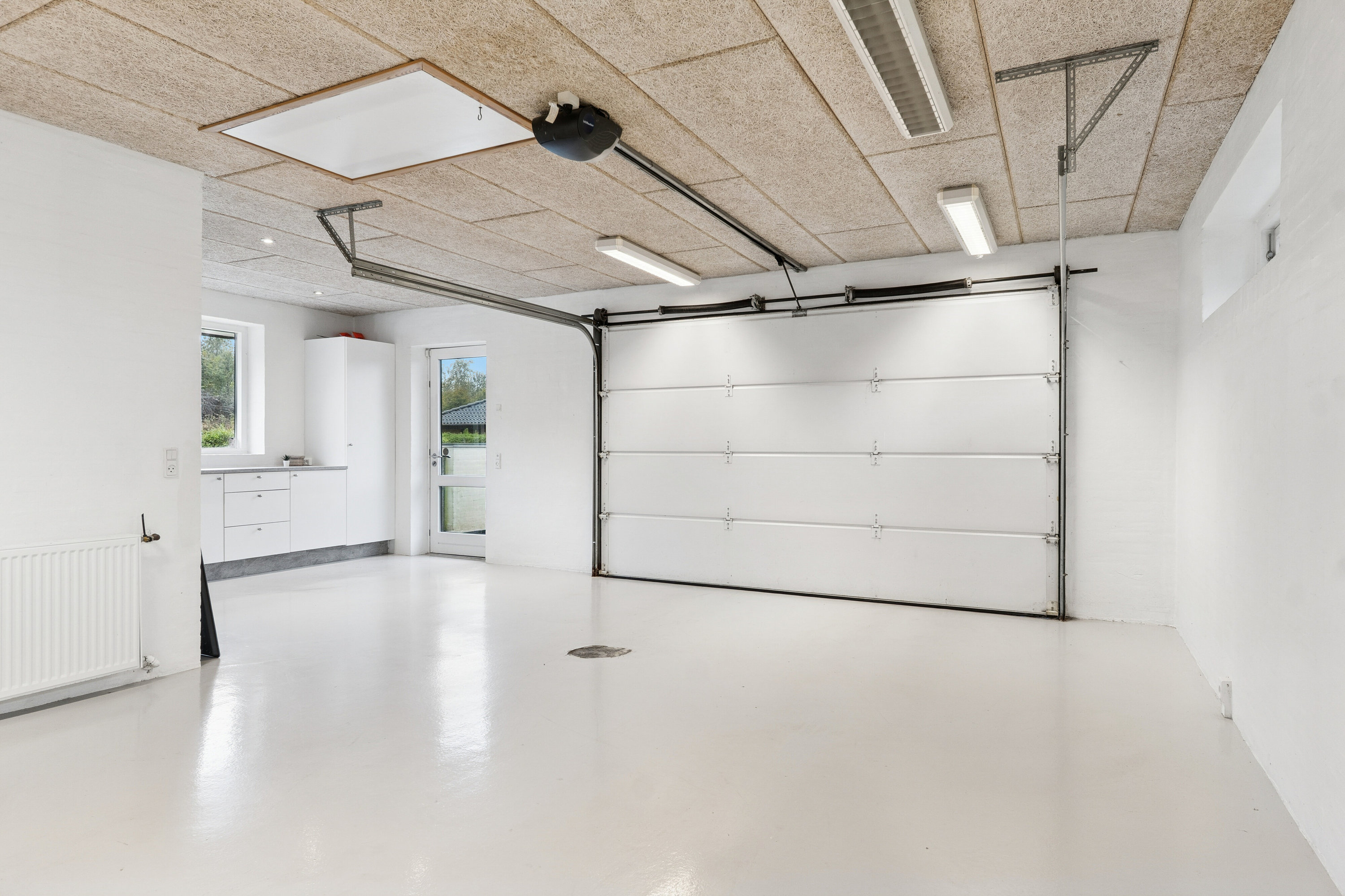 Fremhævet garage billede i fuldskærmstilstand. Billede af Teglgårdshaven 8, 9870 Sindal