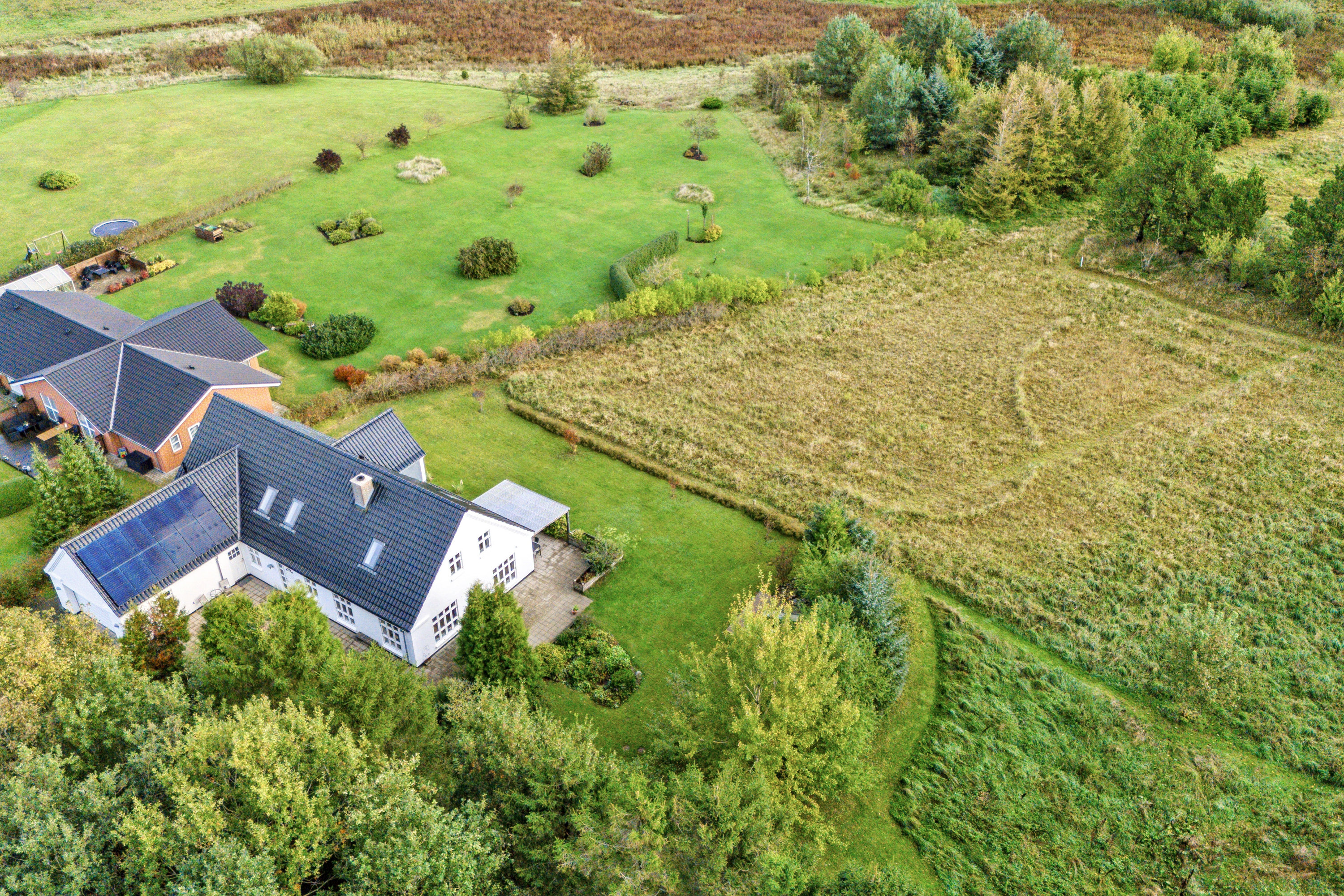 Fremhævet set fra luften billede i fuldskærmstilstand. Billede af Kærvænget 23, Astrup, 9800 Hjørring
