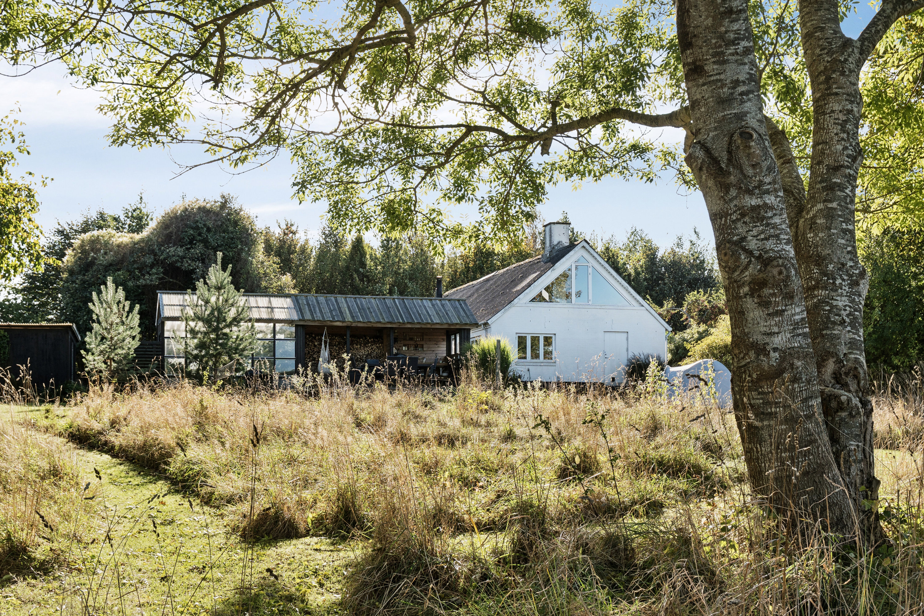 Fremhævet set fra haven billede i fuldskærmstilstand. Billede af Kollekollevej 19, Sv Hestehave, 4572 Nørre Asmindrup