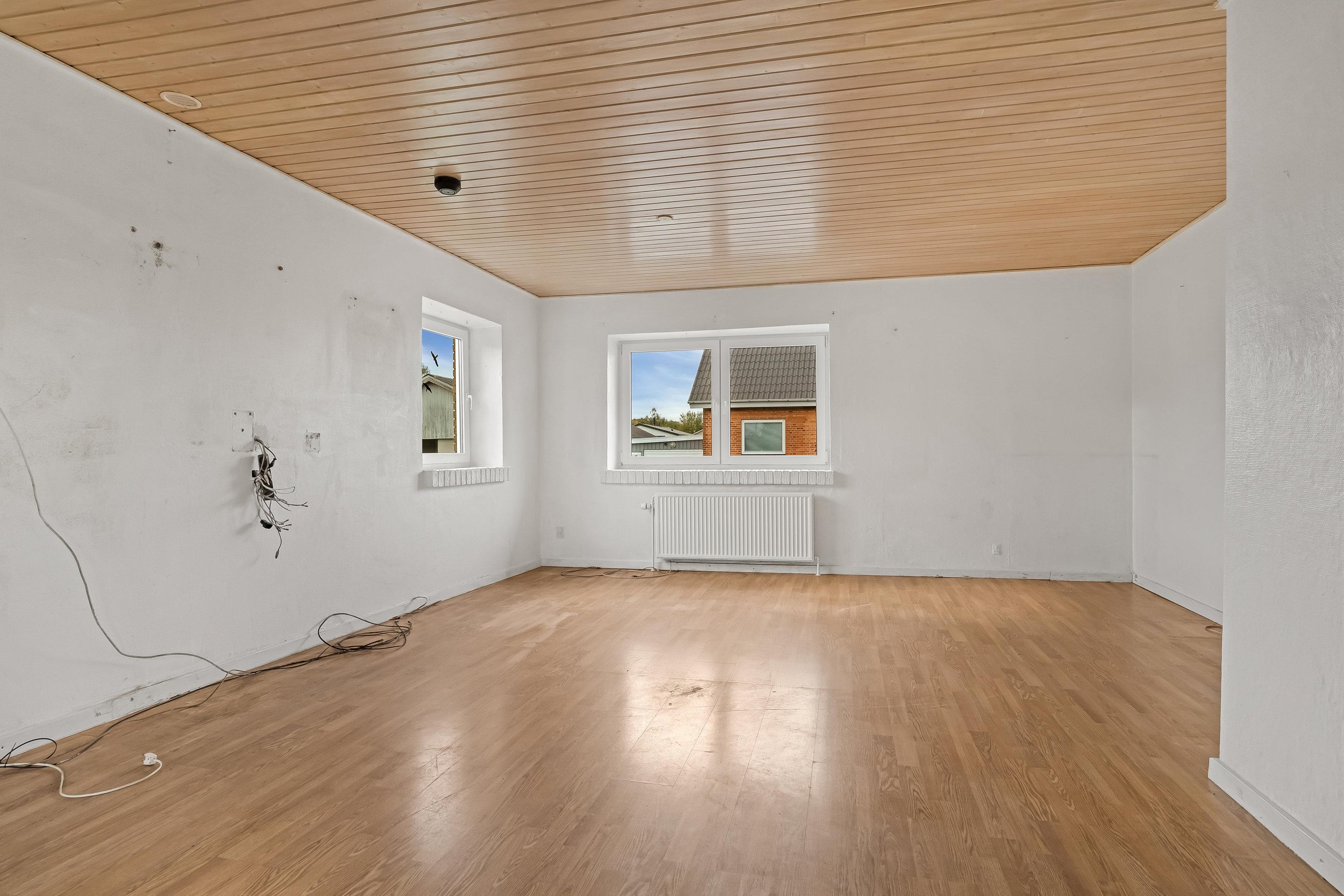 Fremhævet stue billede i fuldskærmstilstand. Billede af Ryesvej 11, 7500 Holstebro