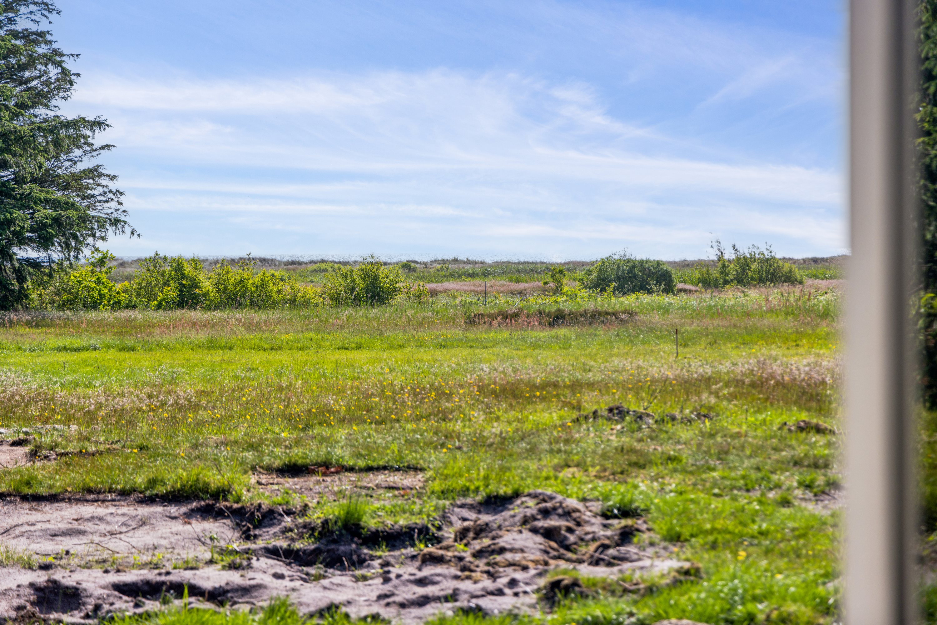 Fremhævet udsigt billede i fuldskærmstilstand. Billede af Koralvej 17, Hou, 9370 Hals