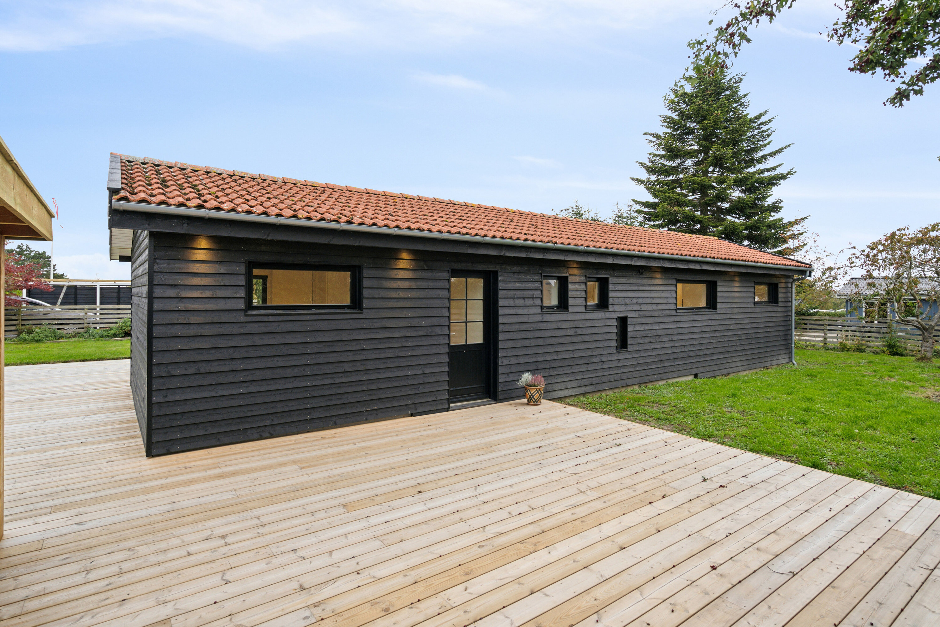 Miniaturebillede 2: terrasse. Billede af Cypresvænget 231, Enø, 4736 Karrebæksminde