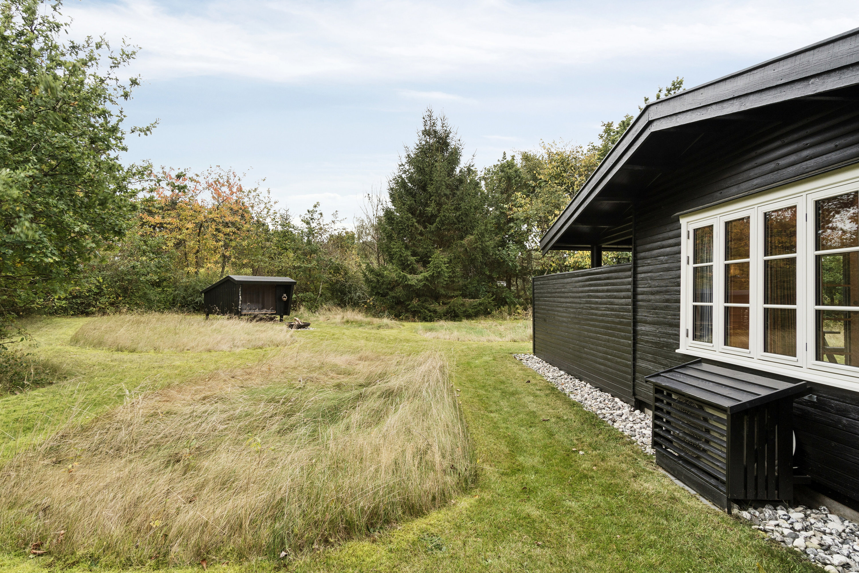 Fremhævet set fra haven billede i fuldskærmstilstand. Billede af Stenbukvej 4, Indelukket, 4550 Asnæs