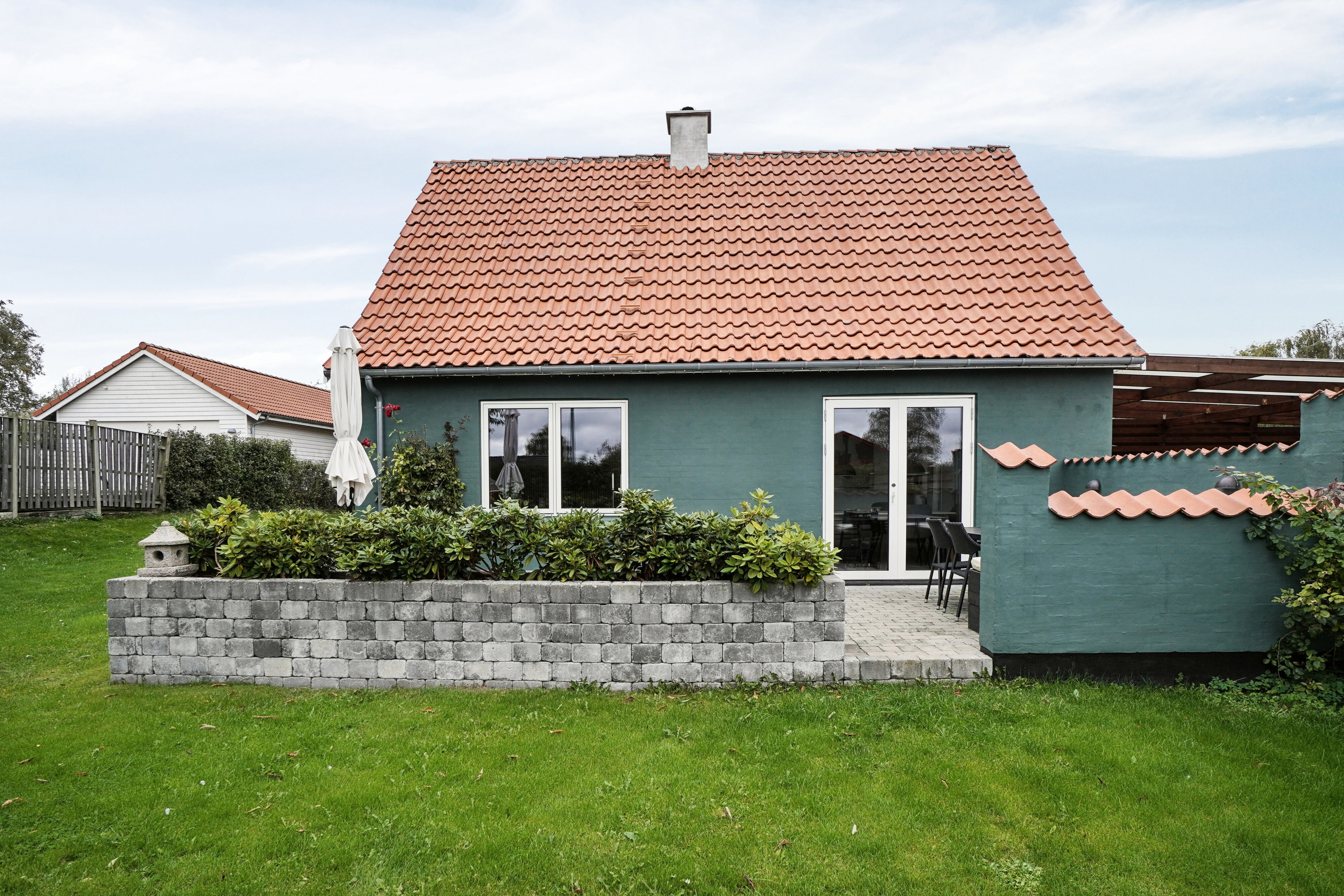 Fremhævet set fra haven billede i fuldskærmstilstand. Billede af Sandbakkevej 29, Kongstrup, 4390 Vipperød