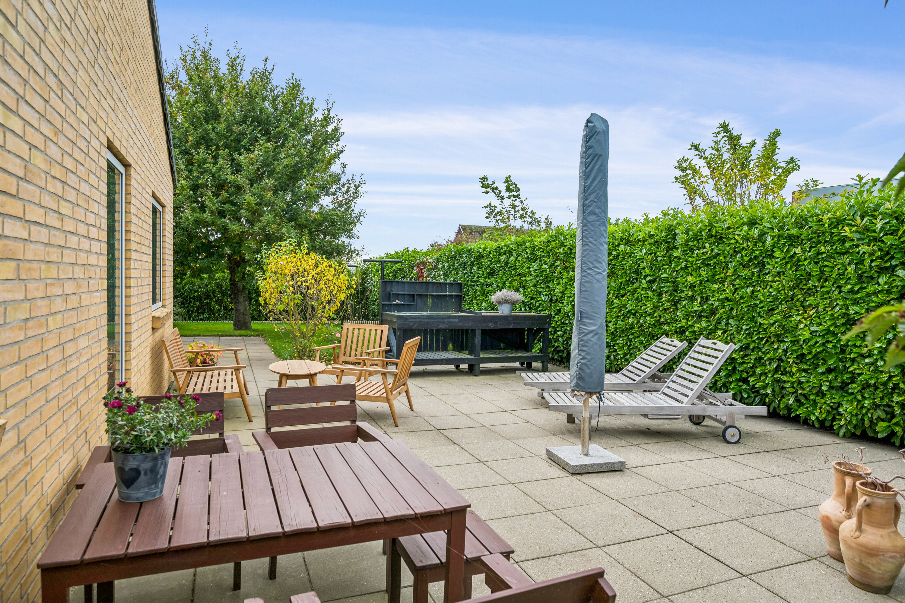 Fremhævet terrasse billede i fuldskærmstilstand. Billede af Bredkær Tværvej 3, 8250 Egå