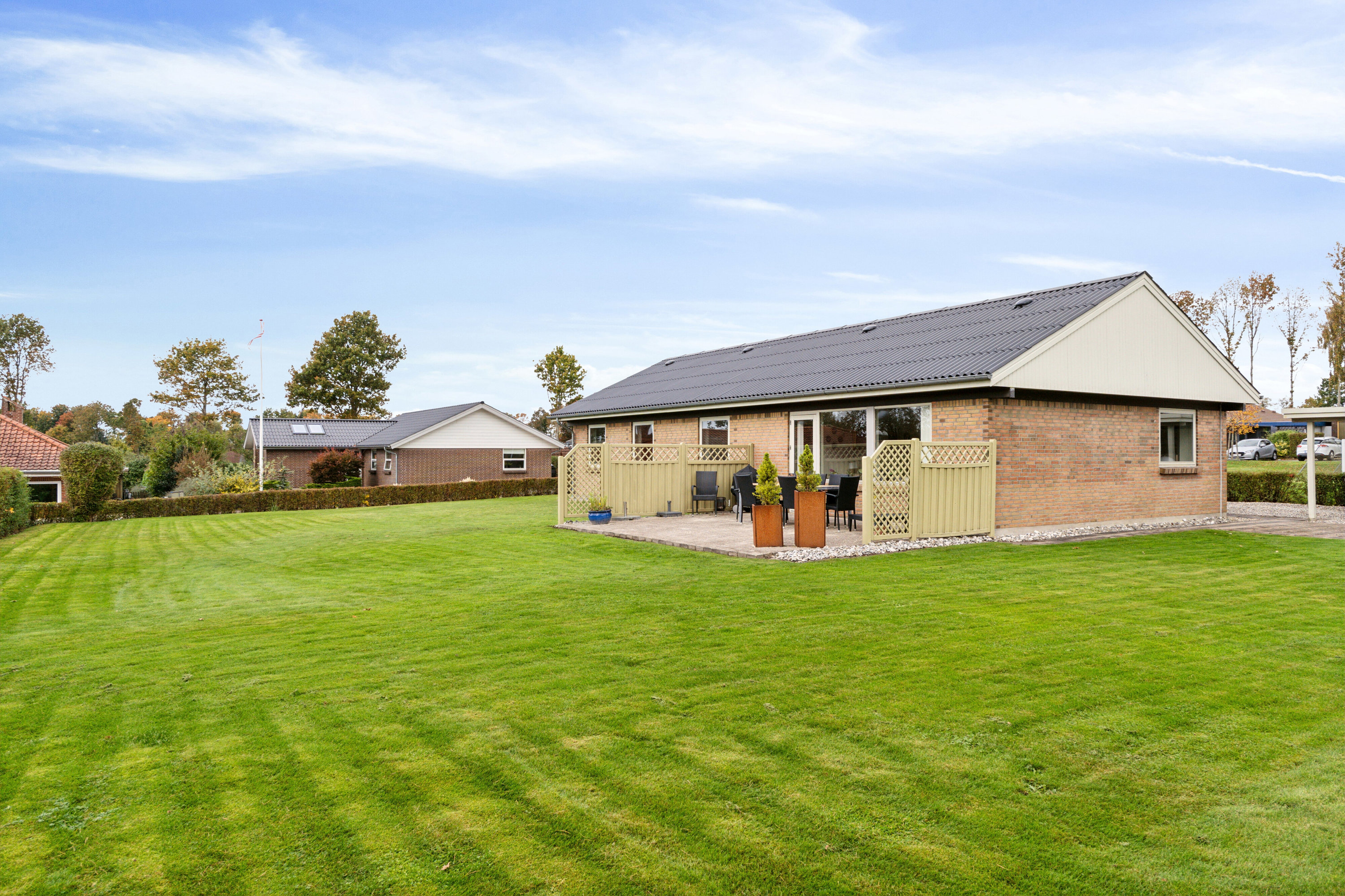 Fremhævet ejendommen set fra haven billede i fuldskærmstilstand. Billede af Nyhusvej 27, Bov, 6330 Padborg