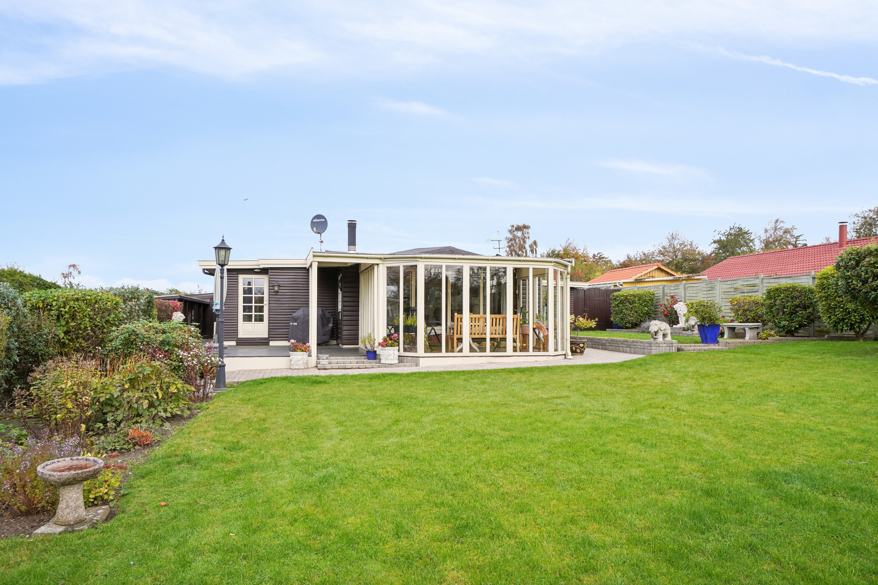 Fremhævet set fra haven billede i fuldskærmstilstand. Billede af Skovbirkvej 9, Ølsted Nordstrand, 3310 Ølsted