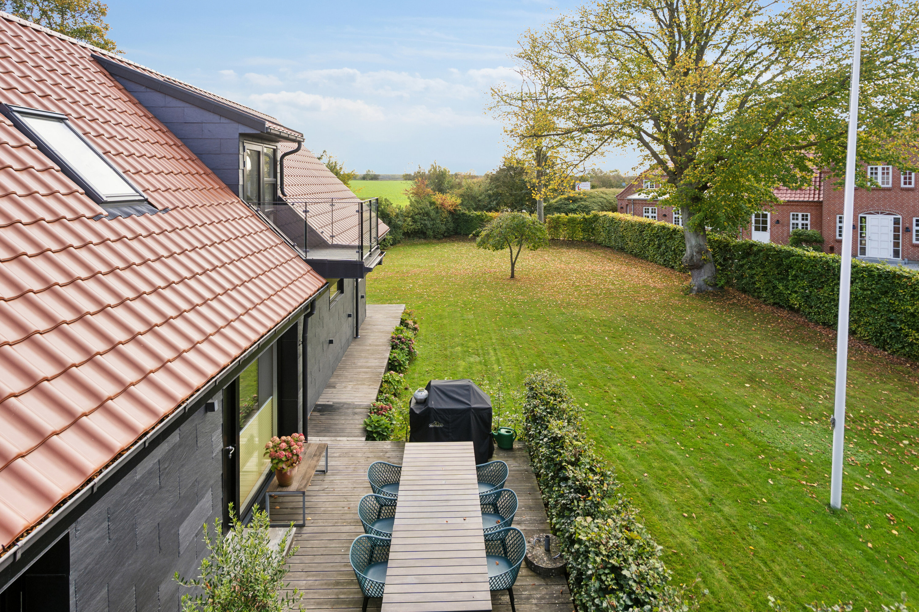 Fremhævet terrasse billede i fuldskærmstilstand. Billede af Søvangsvej 15, Revninge, 5300 Kerteminde