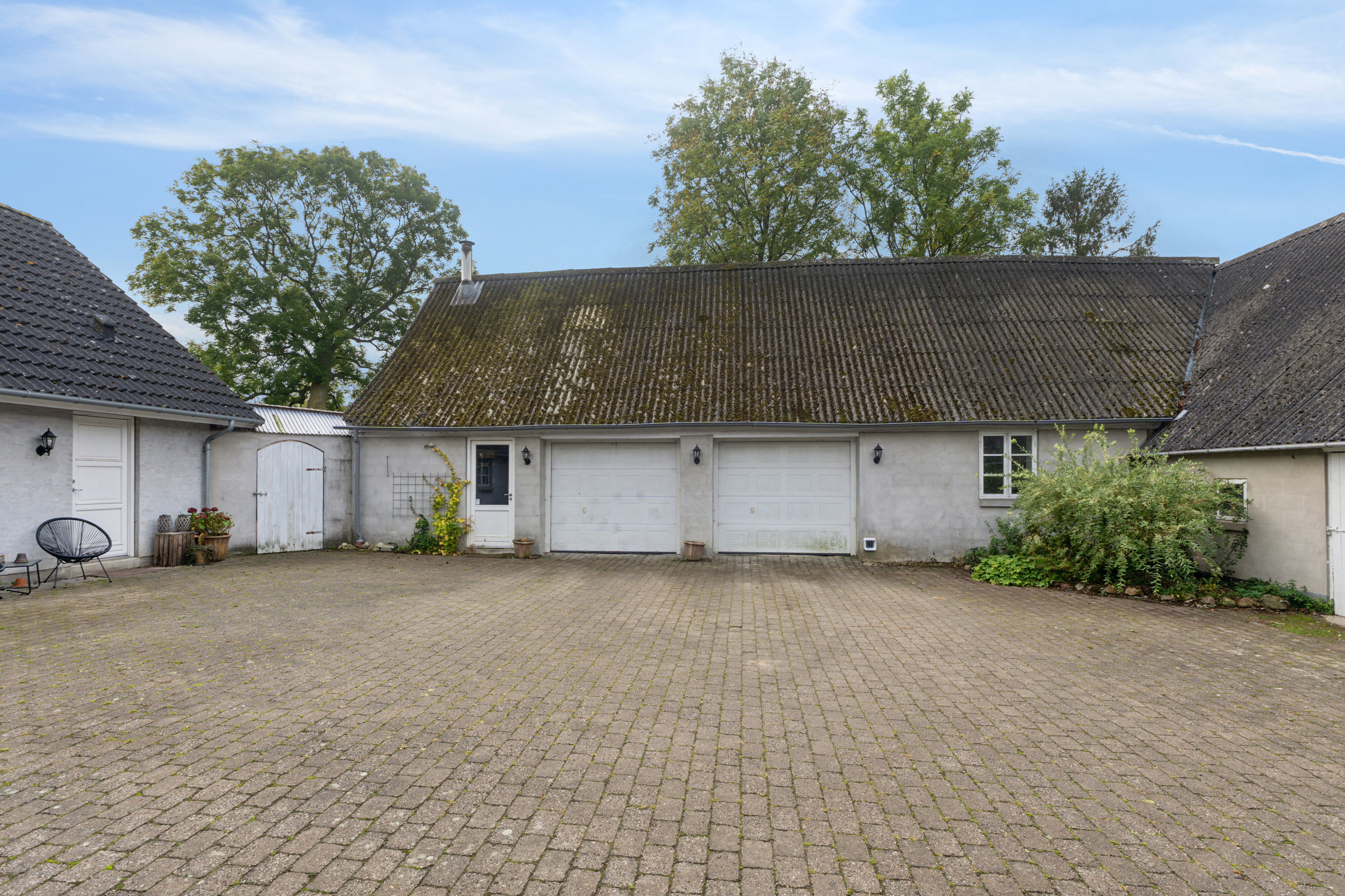 Fremhævet udendørs billede i fuldskærmstilstand. Billede af Høstenvej 21, Høsten, 4690 Haslev