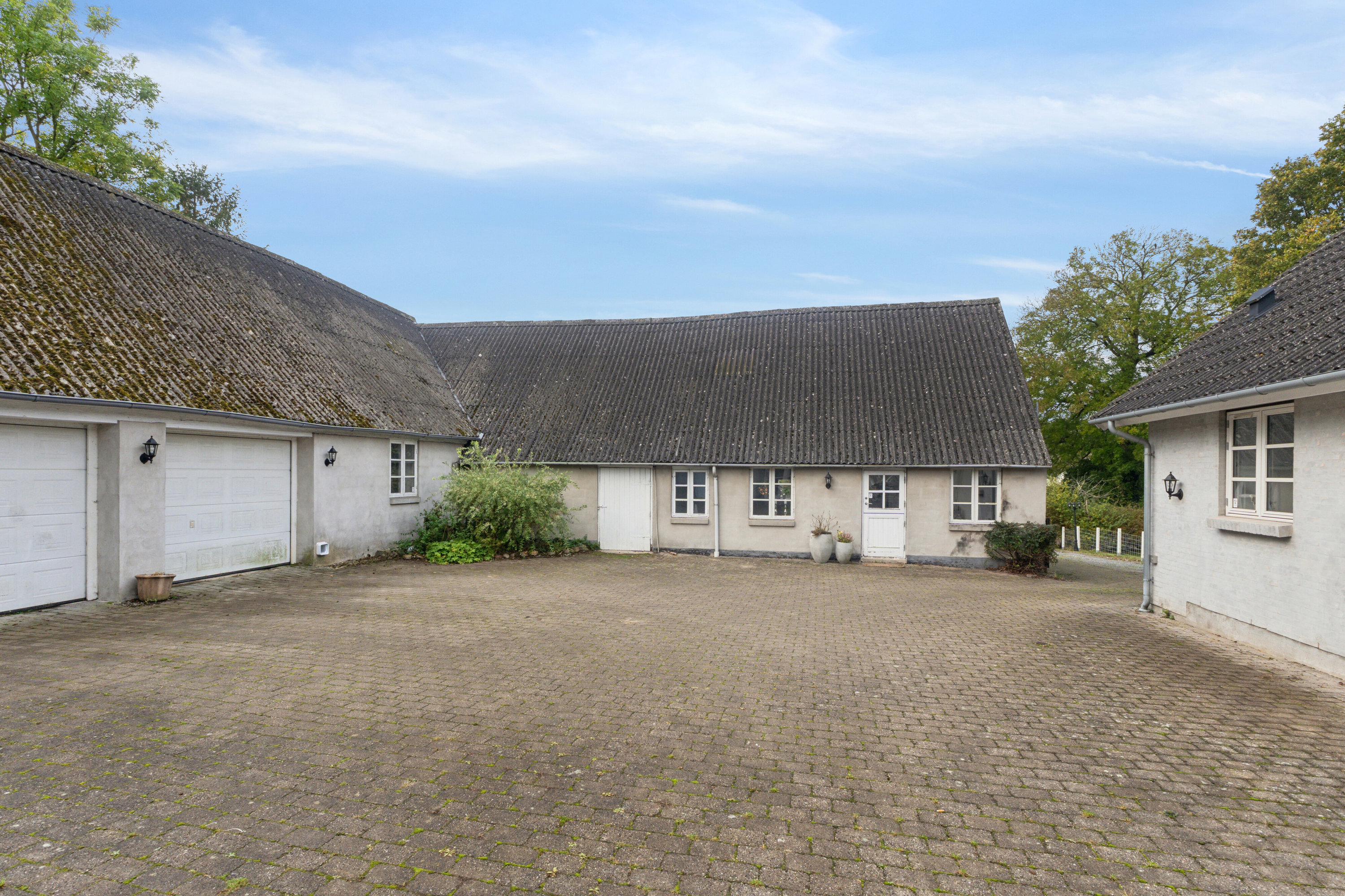 Fremhævet udendørs billede i fuldskærmstilstand. Billede af Høstenvej 21, Høsten, 4690 Haslev