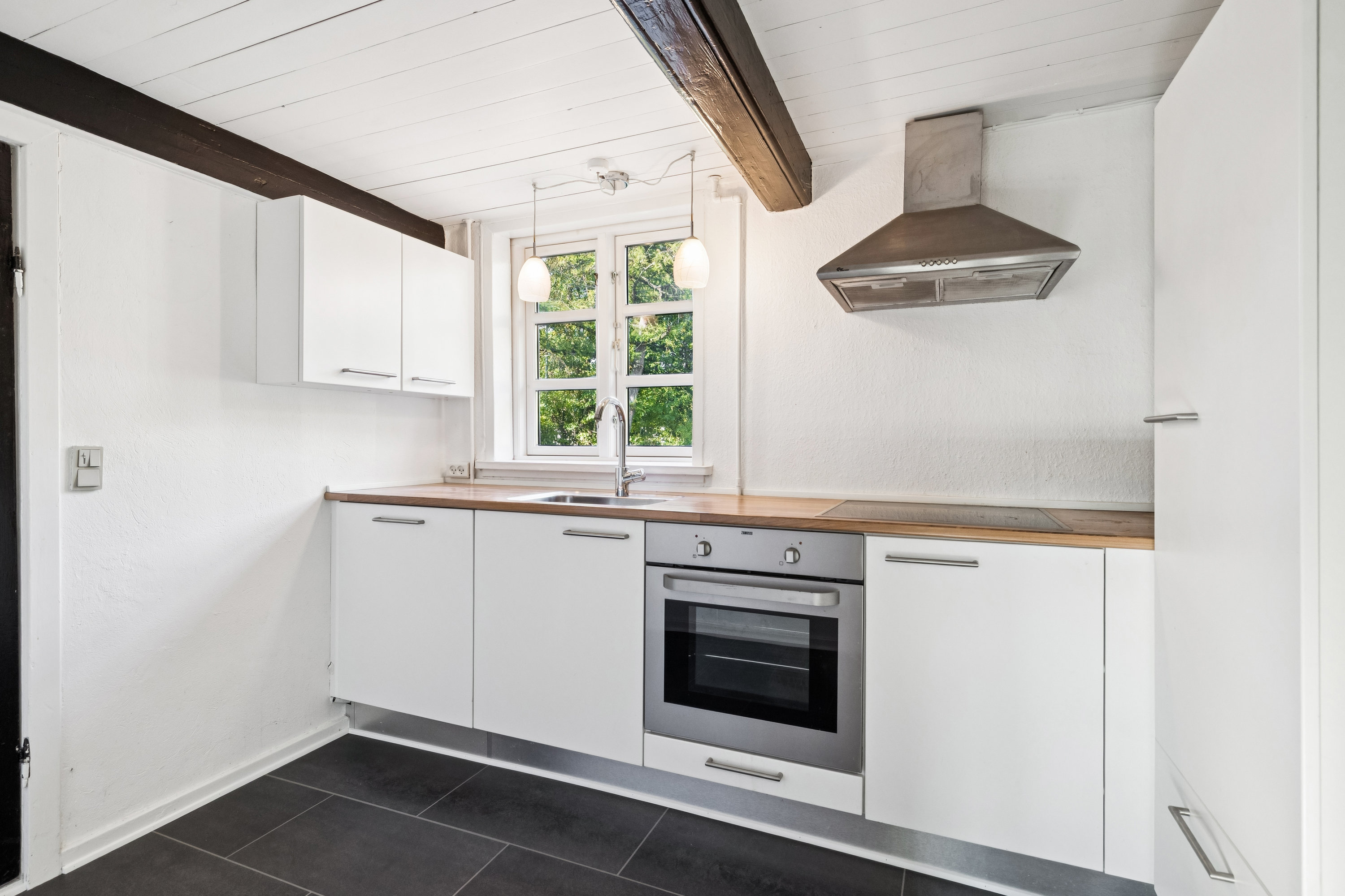 Fremhævet køkken billede i fuldskærmstilstand. Billede af Dyssehøjvej 2, Jennum, 8981 Spentrup