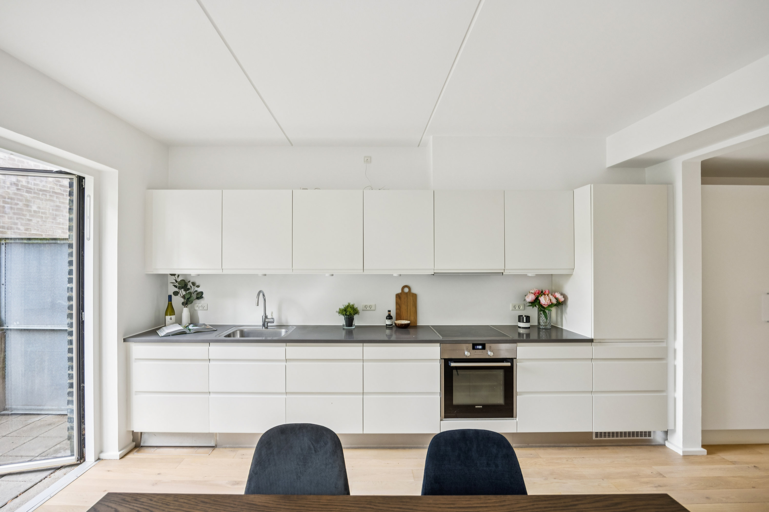 Fremhævet køkken billede i fuldskærmstilstand. Billede af Porcelænshaven 3F, 2000 Frederiksberg