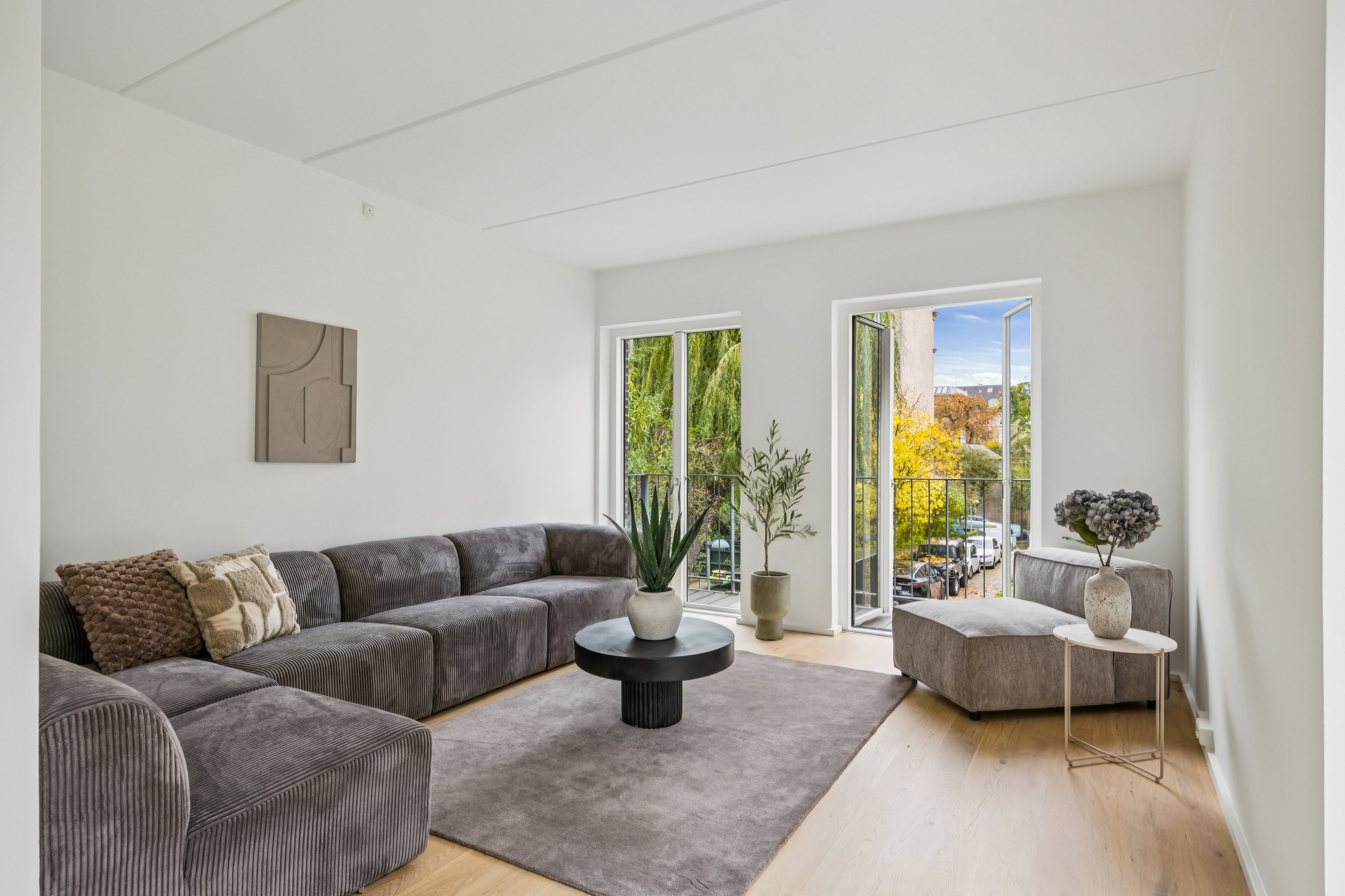 Fremhævet stue billede i fuldskærmstilstand. Billede af Porcelænshaven 3F, 2000 Frederiksberg