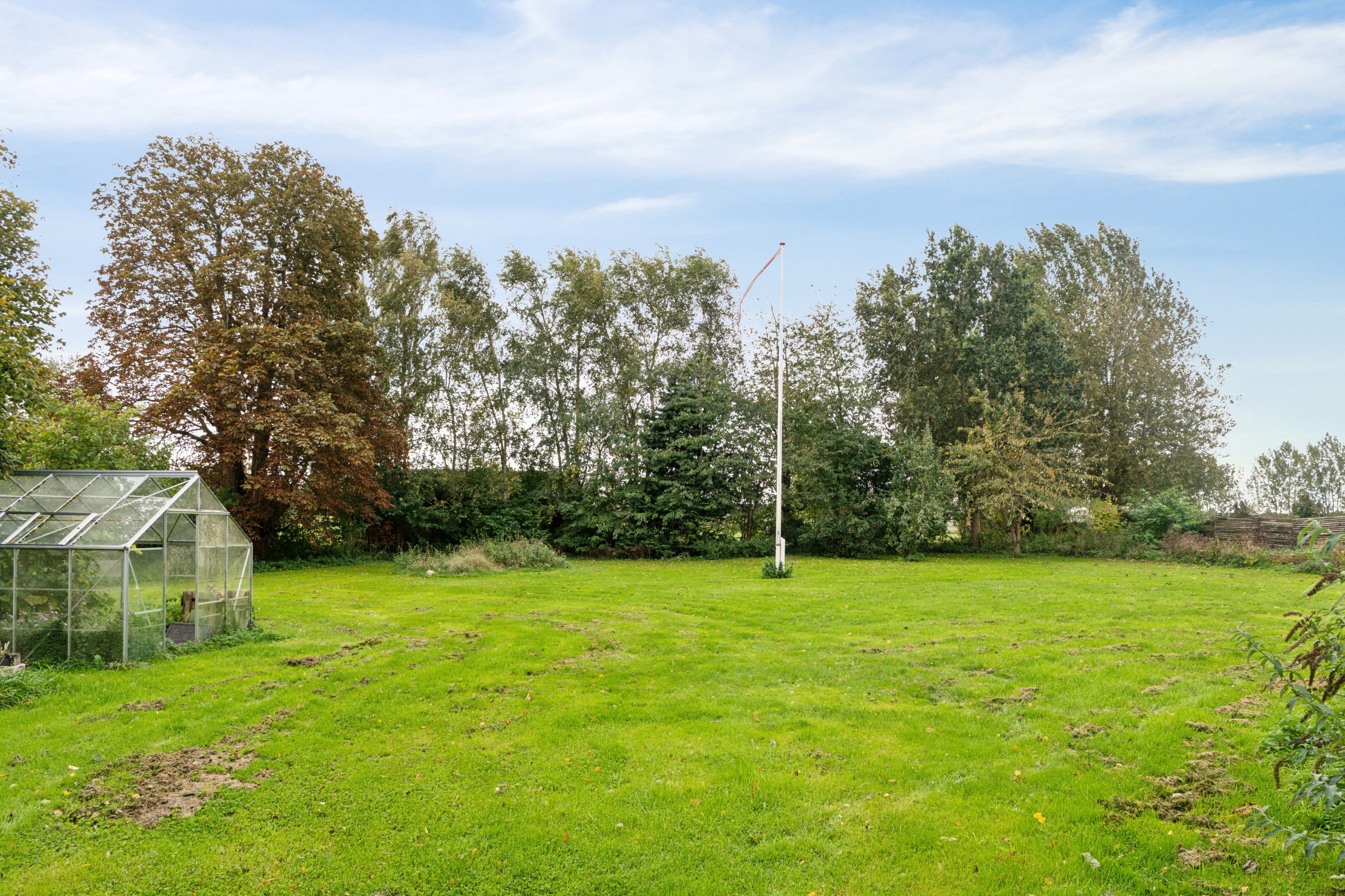 Fremhævet haven billede i fuldskærmstilstand. Billede af Stadionsvej 3, 4735 Mern