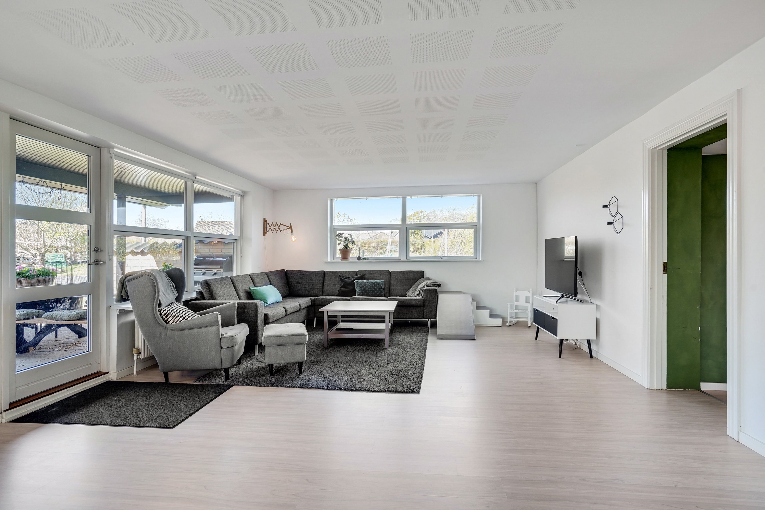 Fremhævet stue billede i fuldskærmstilstand. Billede af Anemonevej 17, 9870 Sindal