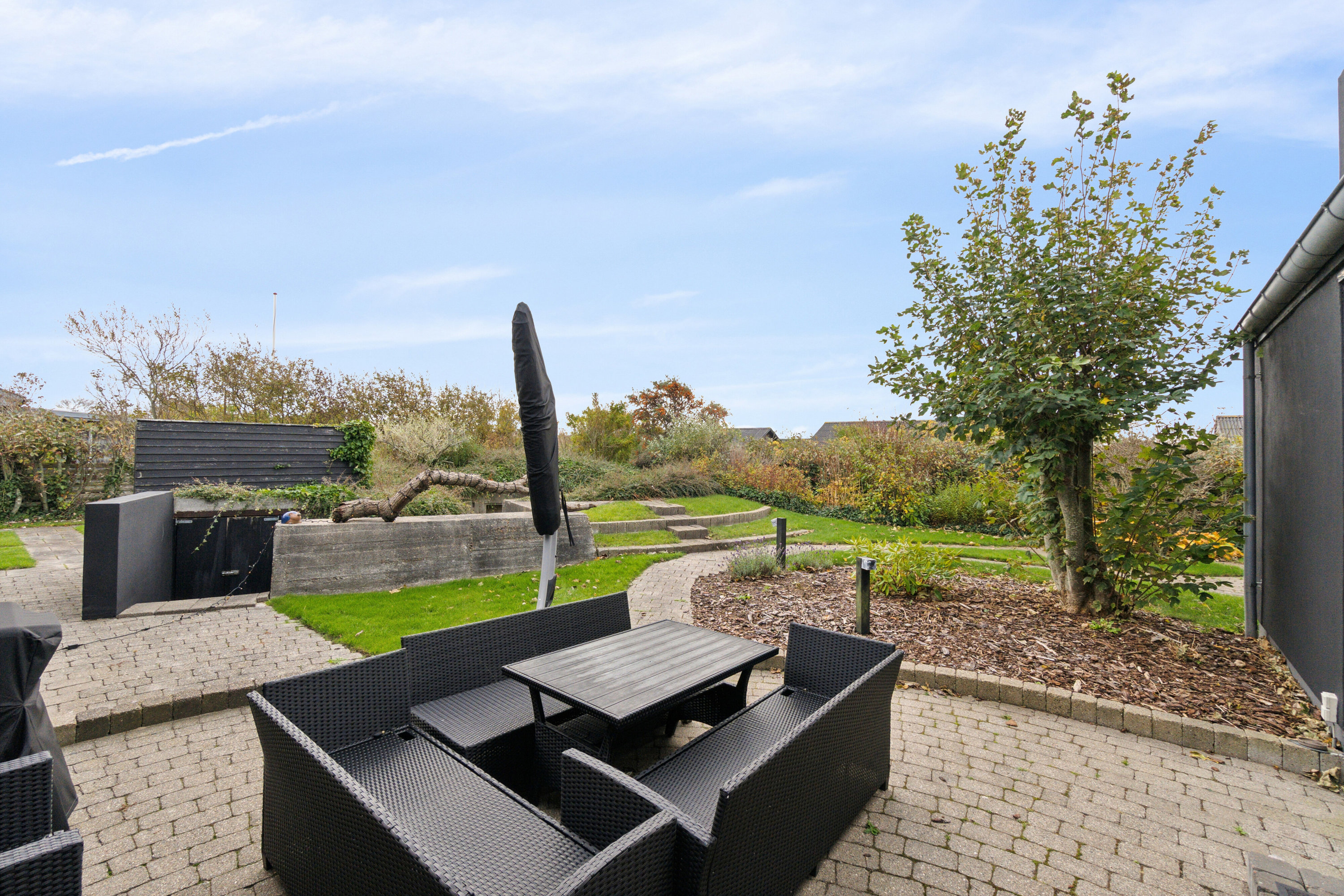 Fremhævet terrasse billede i fuldskærmstilstand. Billede af Gyvelvænget 92, 7730 Hanstholm