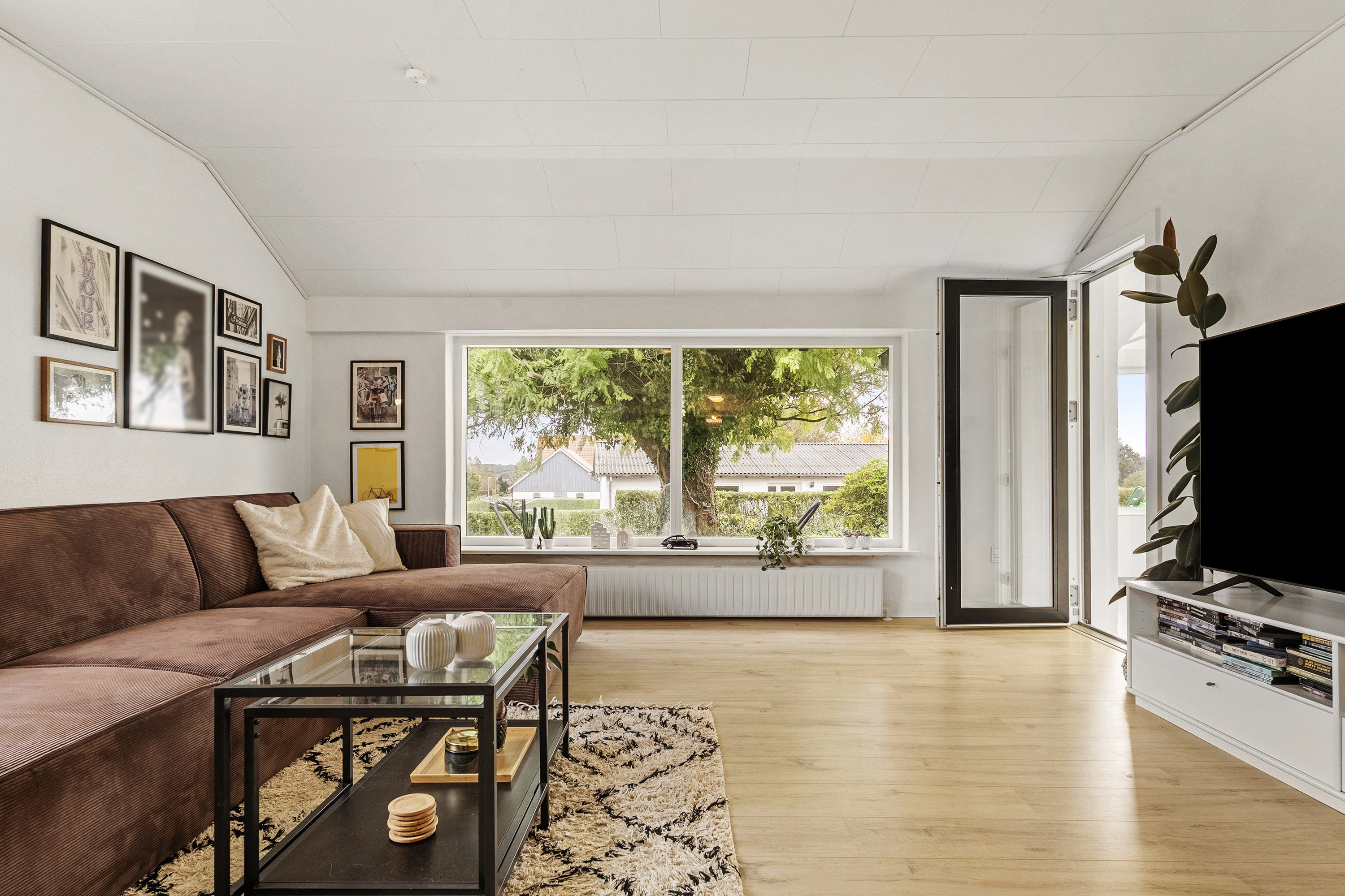 Fremhævet stue billede i fuldskærmstilstand. Billede af Nørreskovvej 15, Genner, 6230 Rødekro