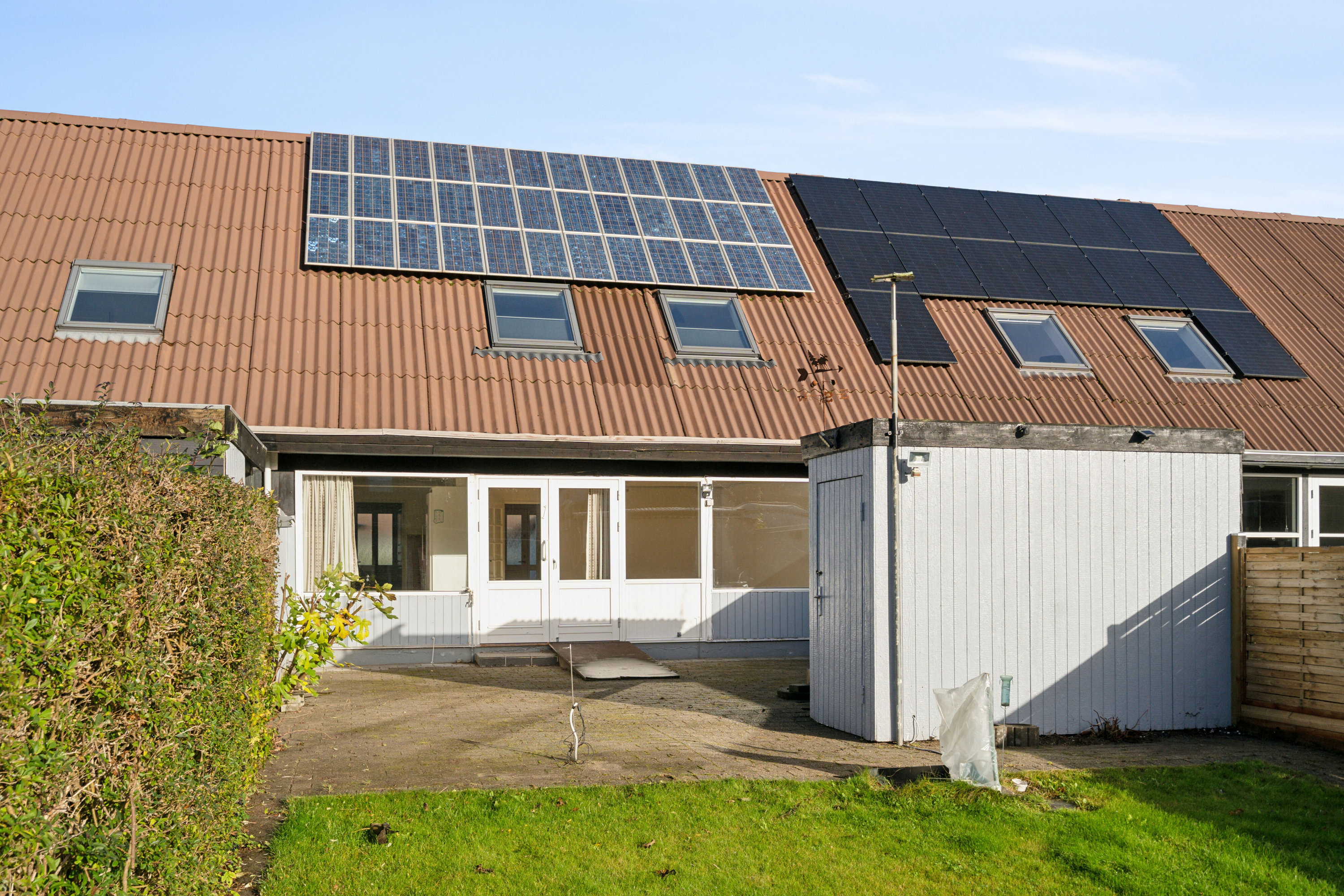 Fremhævet set fra haven billede i fuldskærmstilstand. Billede af Hermelinløkken 46, Korup, 5210 Odense NV