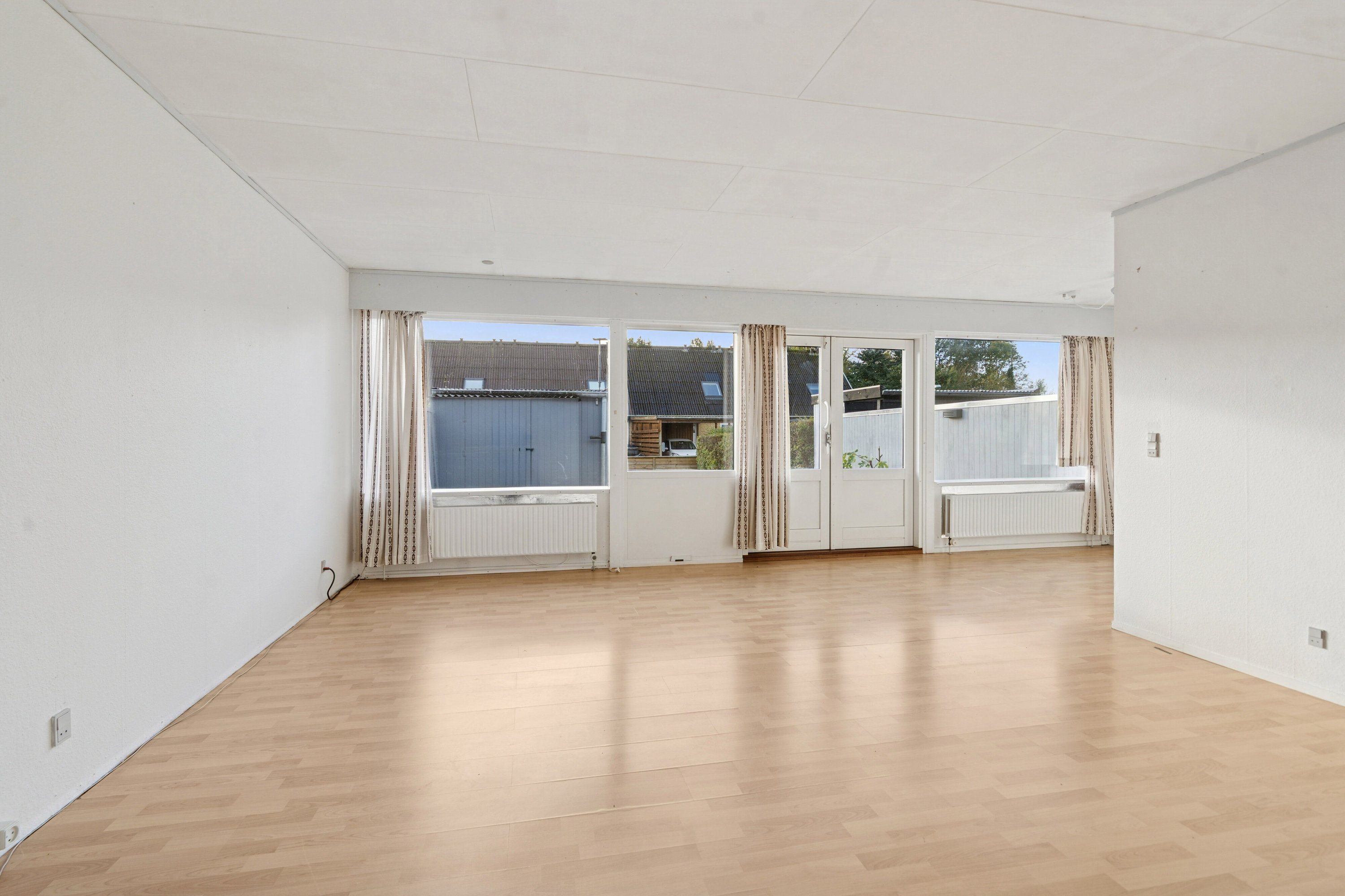 Miniaturebillede 1: stue. Billede af Hermelinløkken 46, Korup, 5210 Odense NV