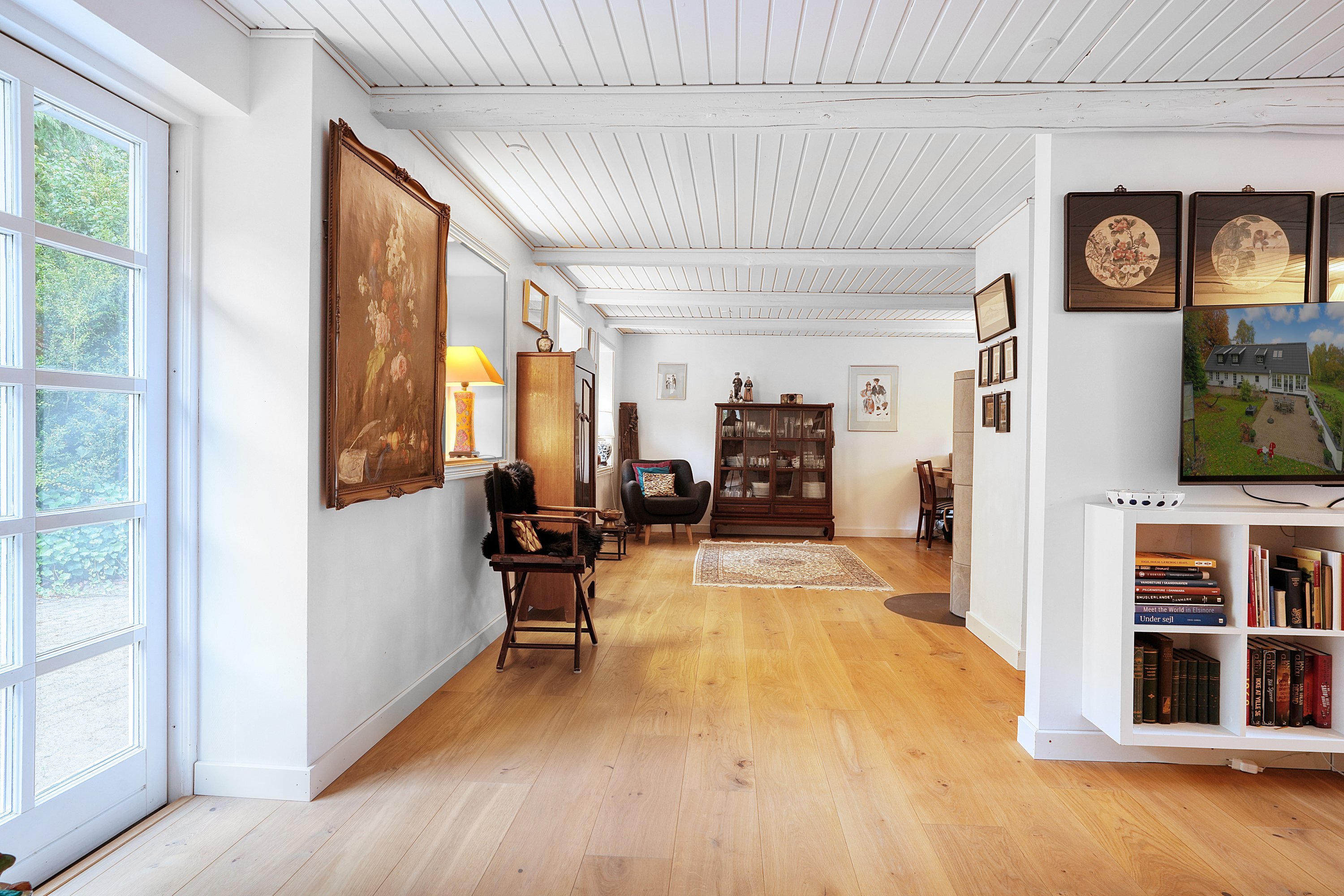 Fremhævet stue billede i fuldskærmstilstand. Billede af Holmenevej 25, Holmene, 3140 Ålsgårde