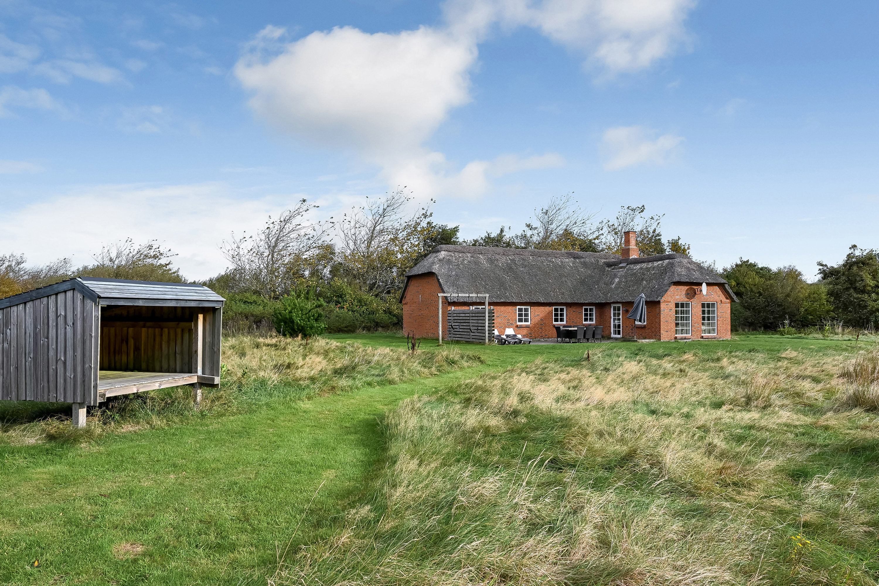 Fremhævet ejendommen billede i fuldskærmstilstand. Billede af Øvej 13, Husby Strandenge, 6990 Ulfborg