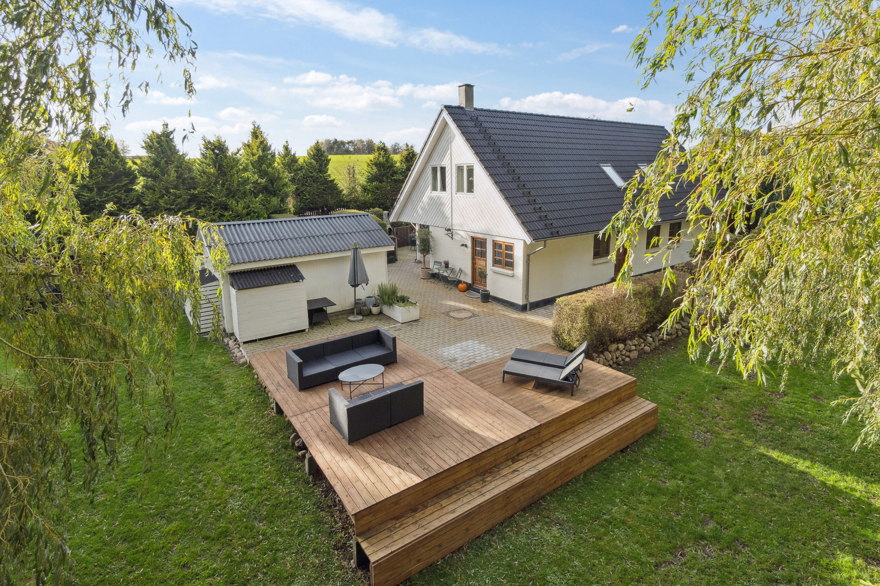 Villa: Set fra haven på Gadekæret 2, 8781 Stenderup