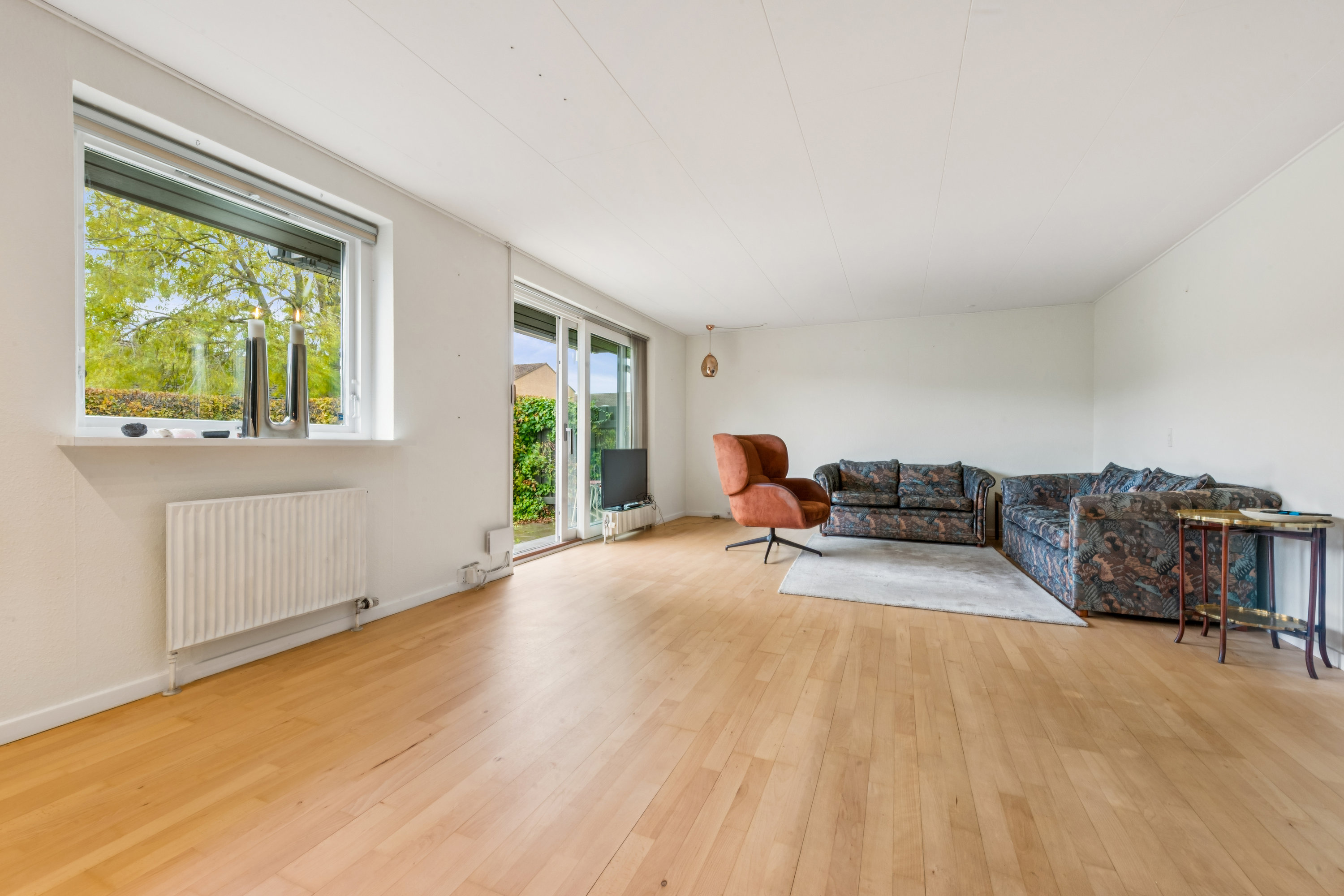 Fremhævet stue billede i fuldskærmstilstand. Billede af Morbærhegnet 53, 2670 Greve