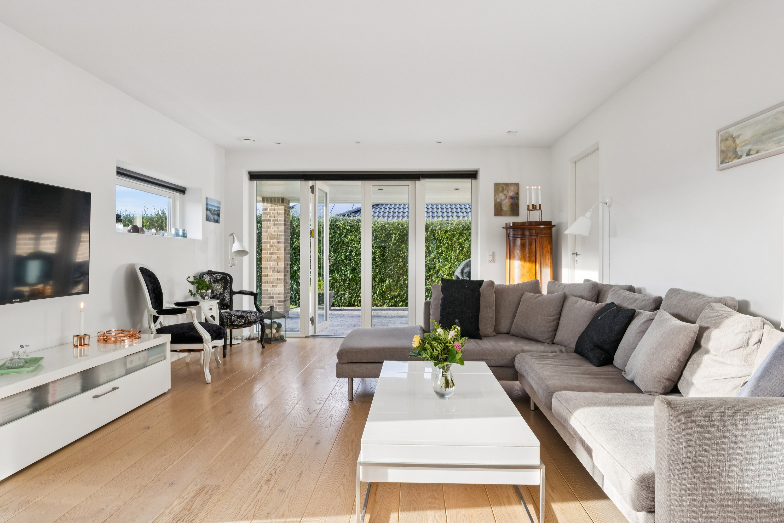 Fremhævet stue billede i fuldskærmstilstand. Billede af Jordbærvænget 9, 4660 Store Heddinge