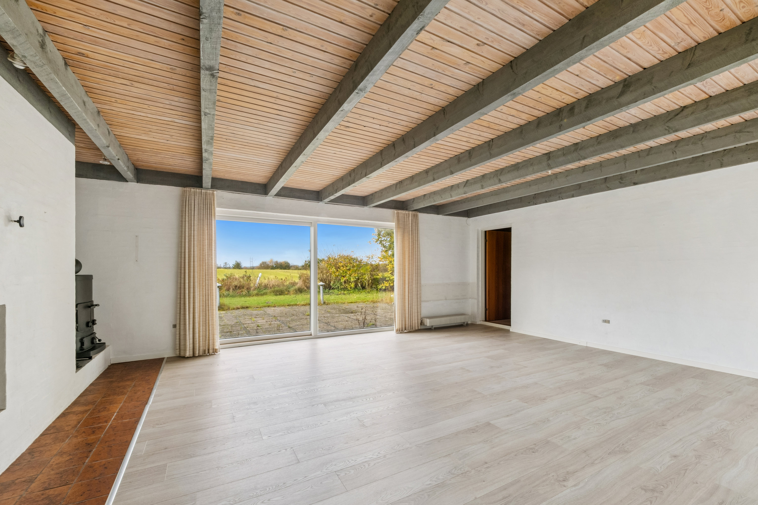 Fremhævet stue billede i fuldskærmstilstand. Billede af Ulvkjærvej 23, Fly, 7800 Skive