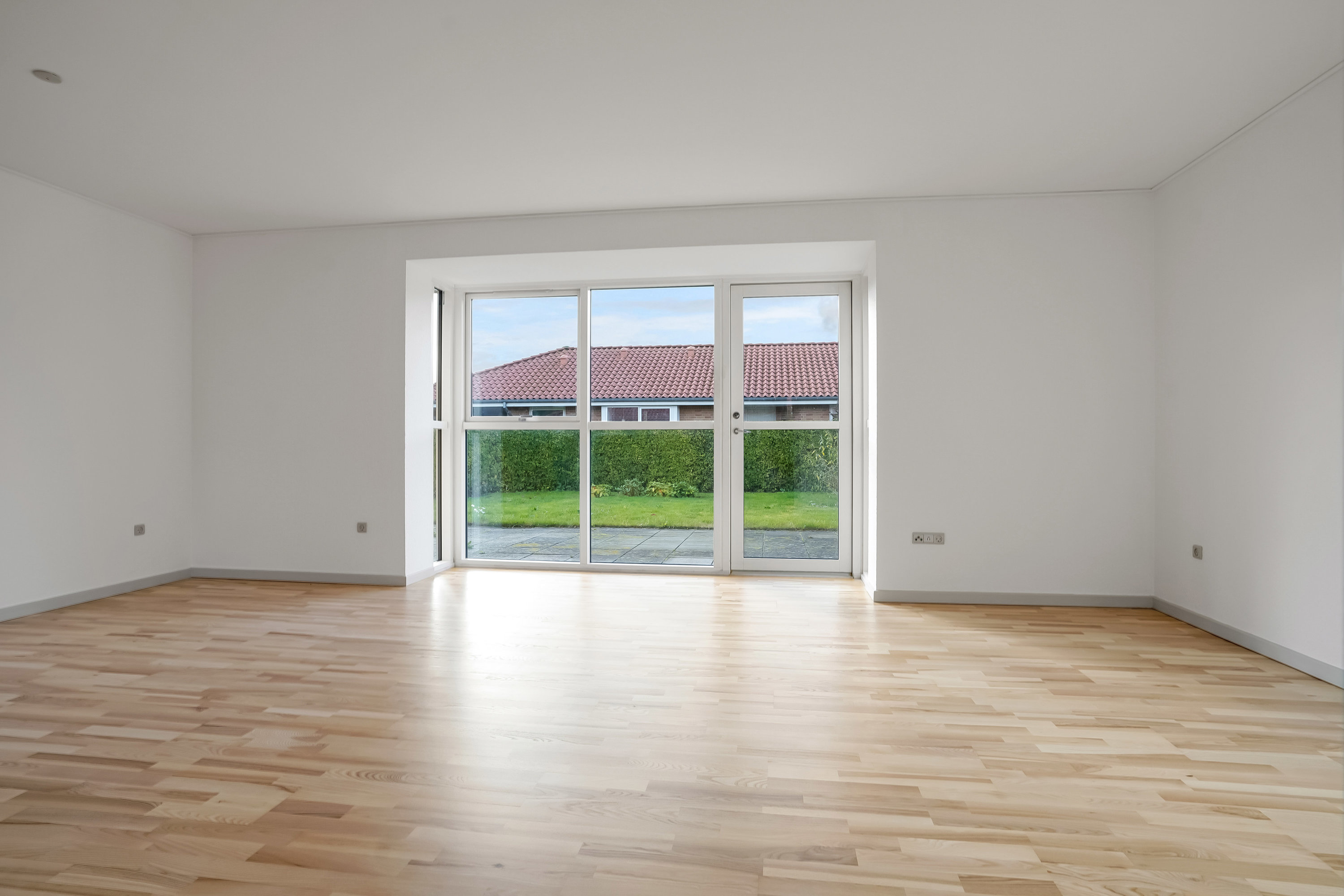 Fremhævet stue billede i fuldskærmstilstand. Billede af Rødtjørnvej 6, Ejlstrup, 5200 Odense V