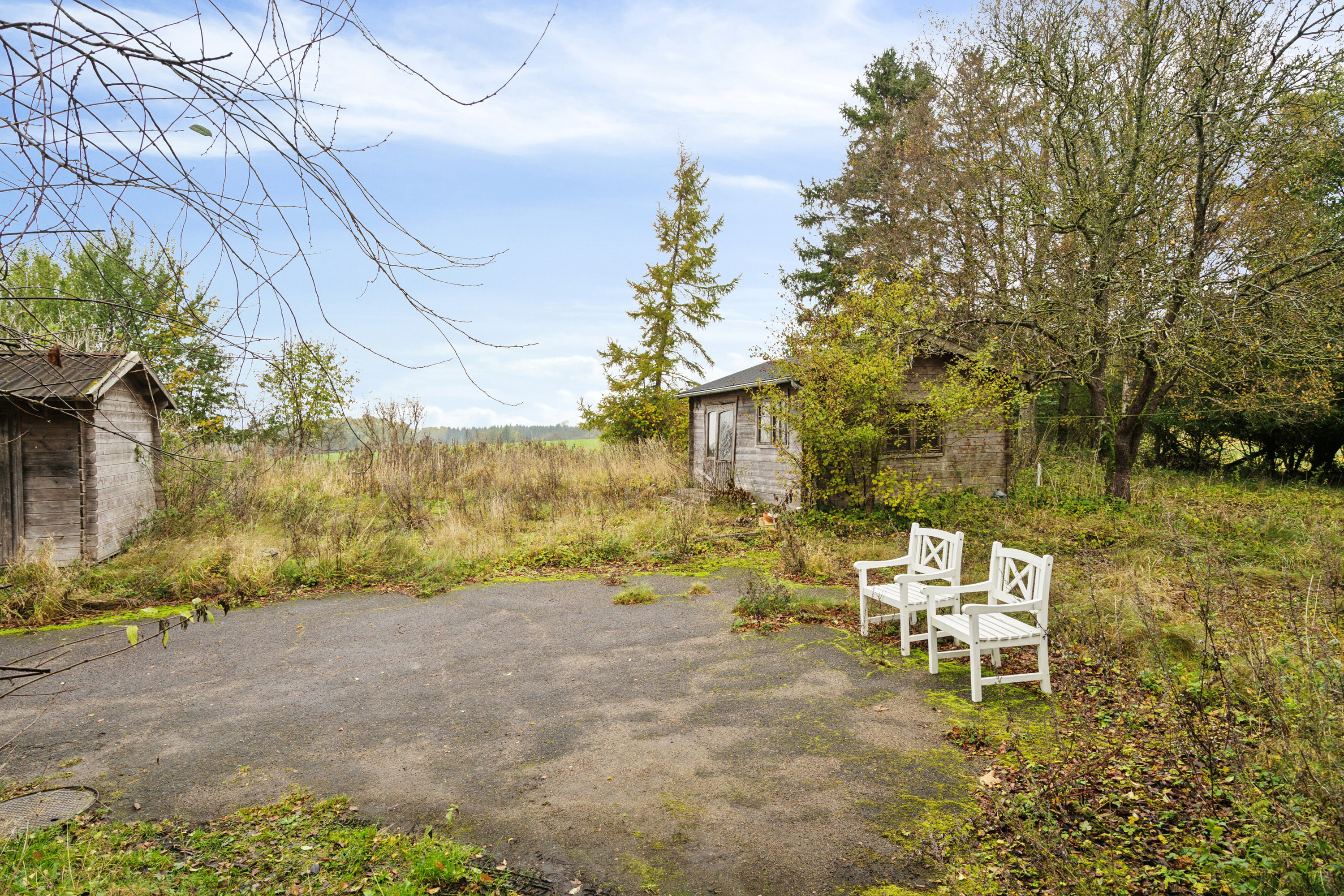 Fremhævet set fra haven billede i fuldskærmstilstand. Billede af Hovkrog 3, 4684 Holmegaard