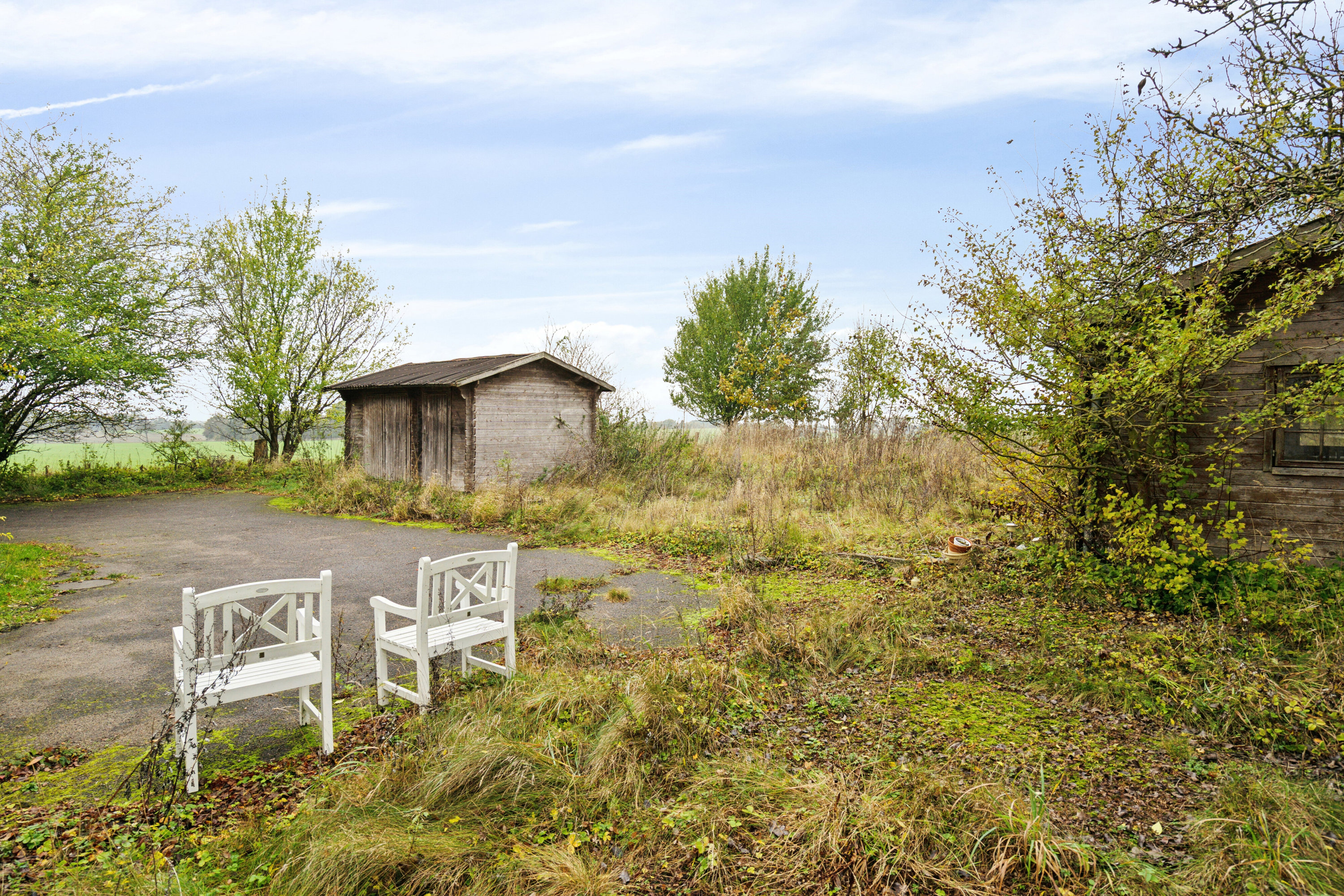 Fremhævet set fra haven billede i fuldskærmstilstand. Billede af Hovkrog 3, 4684 Holmegaard