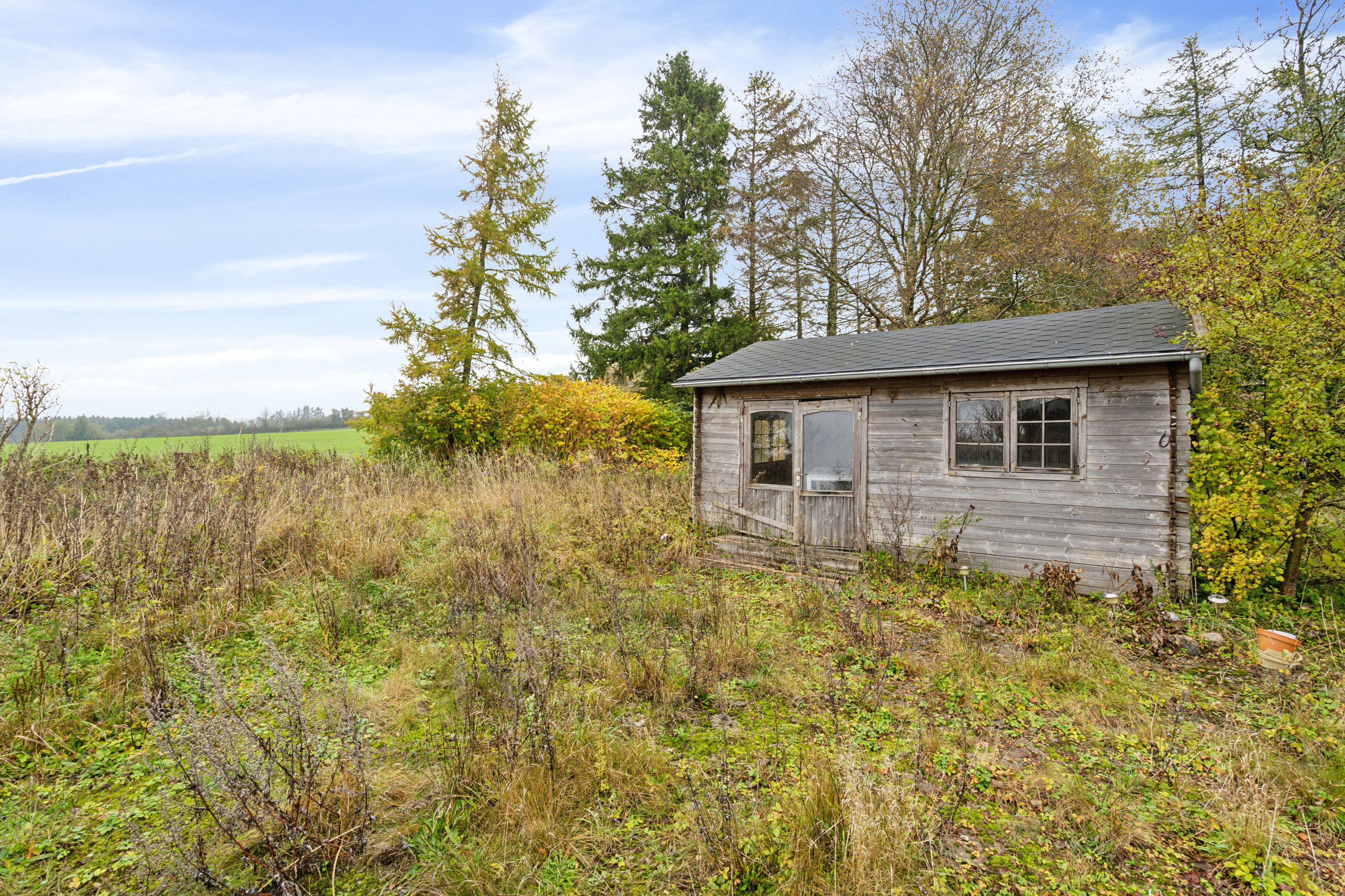 Fremhævet set fra haven billede i fuldskærmstilstand. Billede af Hovkrog 3, 4684 Holmegaard