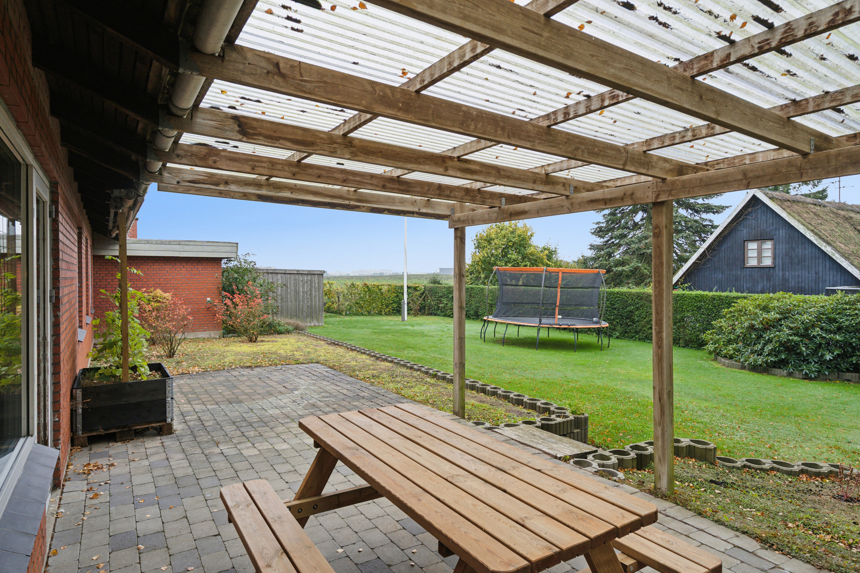 Fremhævet overdækket terrasse billede i fuldskærmstilstand. Billede af Gl Skolevej 17, Askov, 4733 Tappernøje