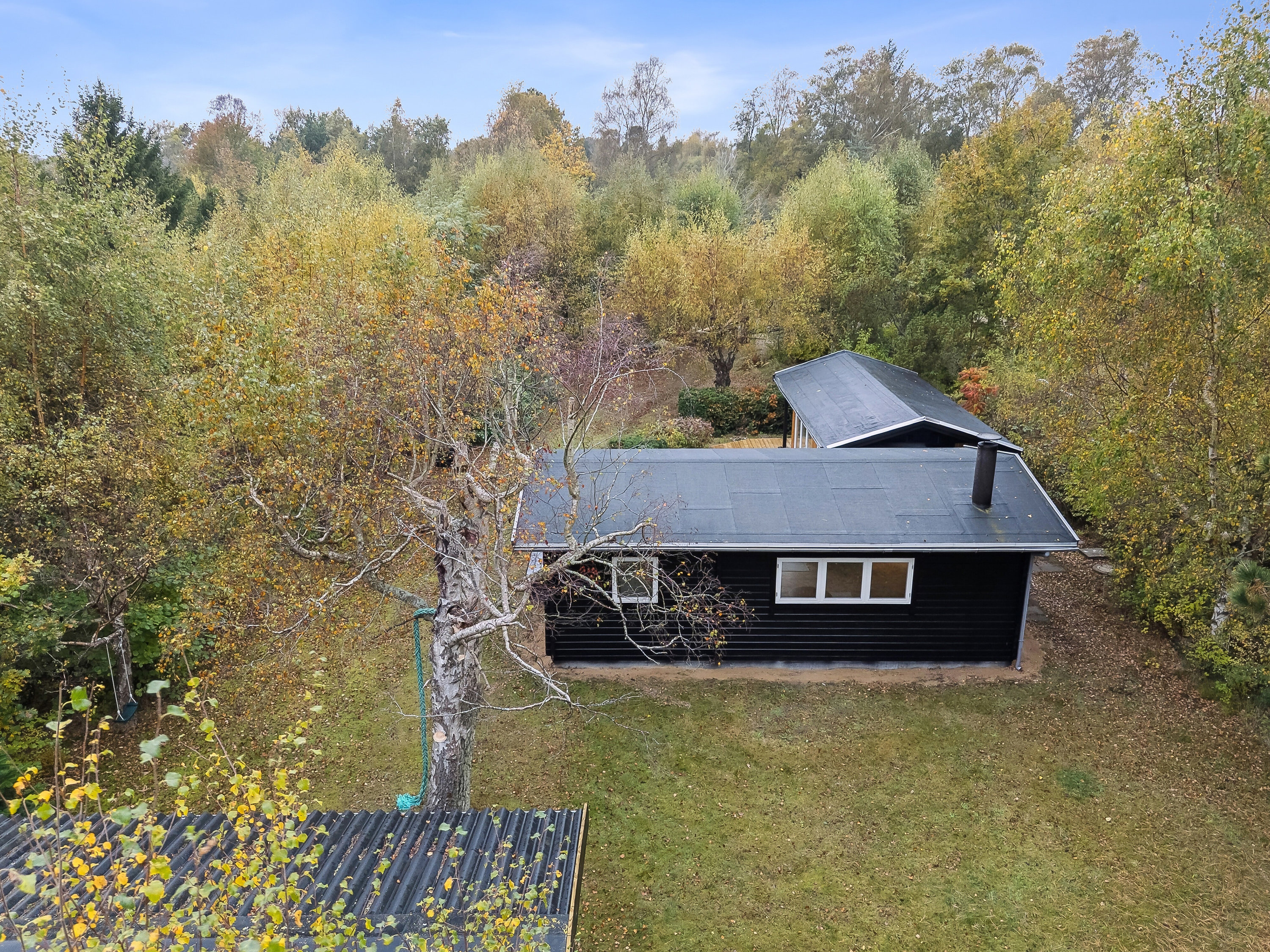 Fremhævet set fra haven billede i fuldskærmstilstand. Billede af Udmarken 13, 4400 Kalundborg