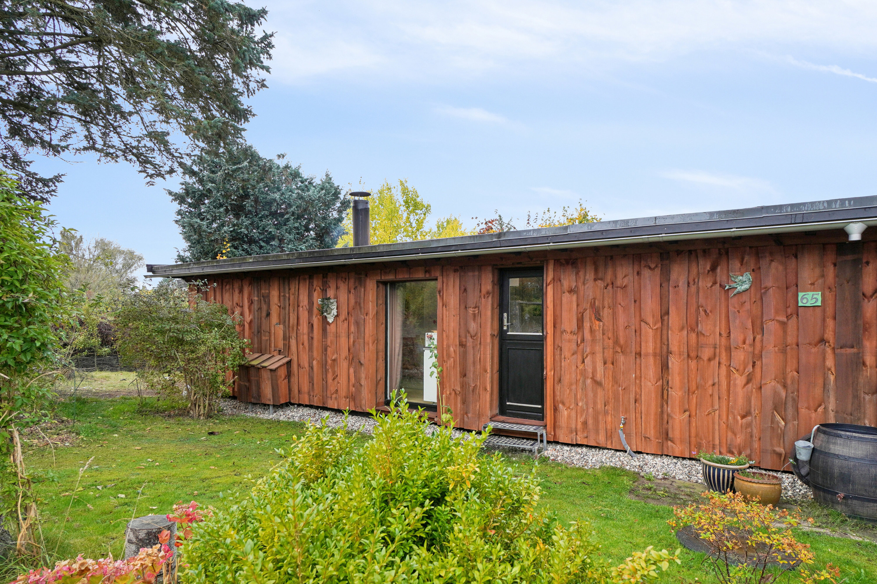 Fremhævet set fra haven billede i fuldskærmstilstand. Billede af Maxivej 65, Store Havelse Strand, 3310 Ølsted