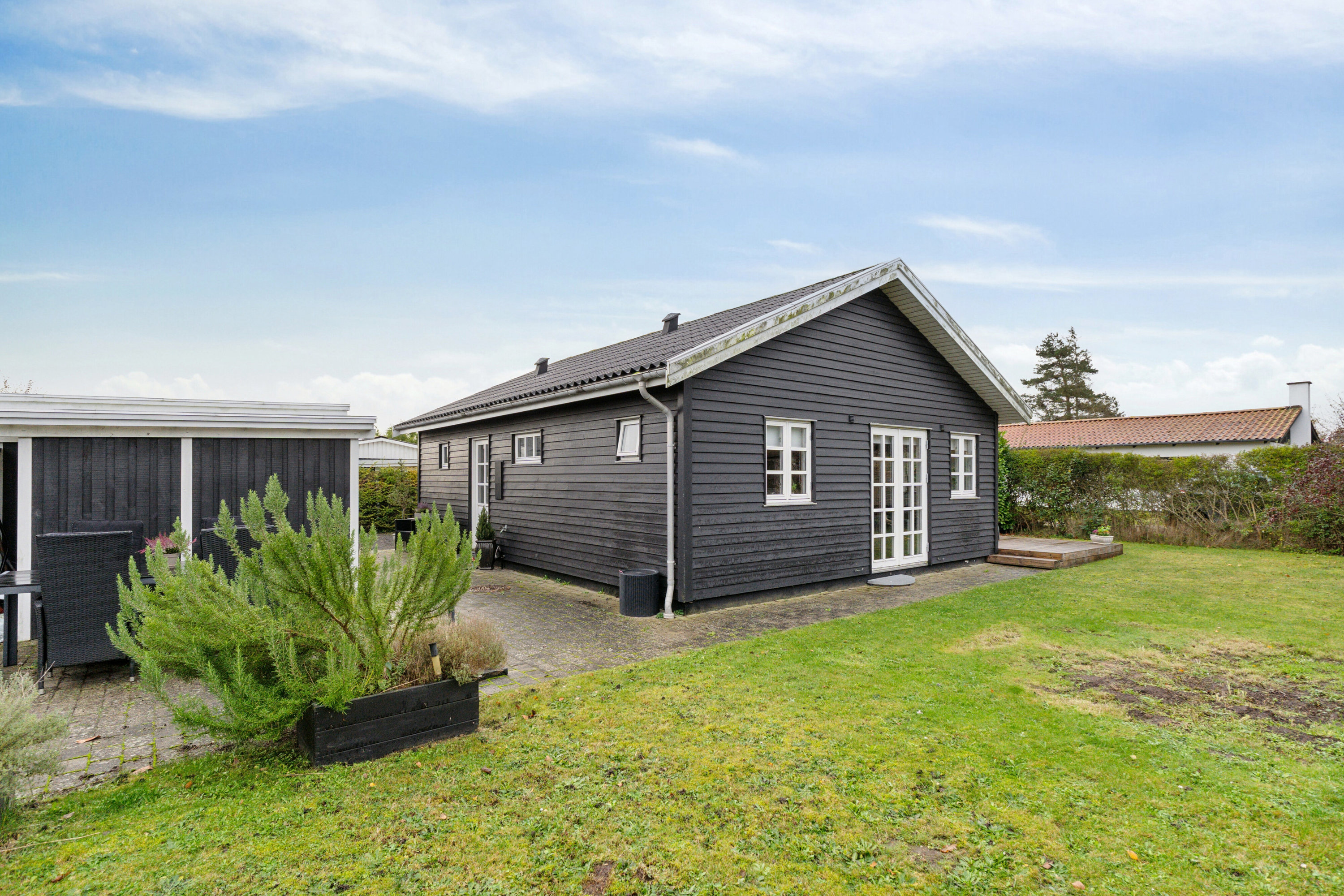 Fremhævet set fra haven billede i fuldskærmstilstand. Billede af Ved Bækken 7, Hasmark Strand, 5450 Otterup