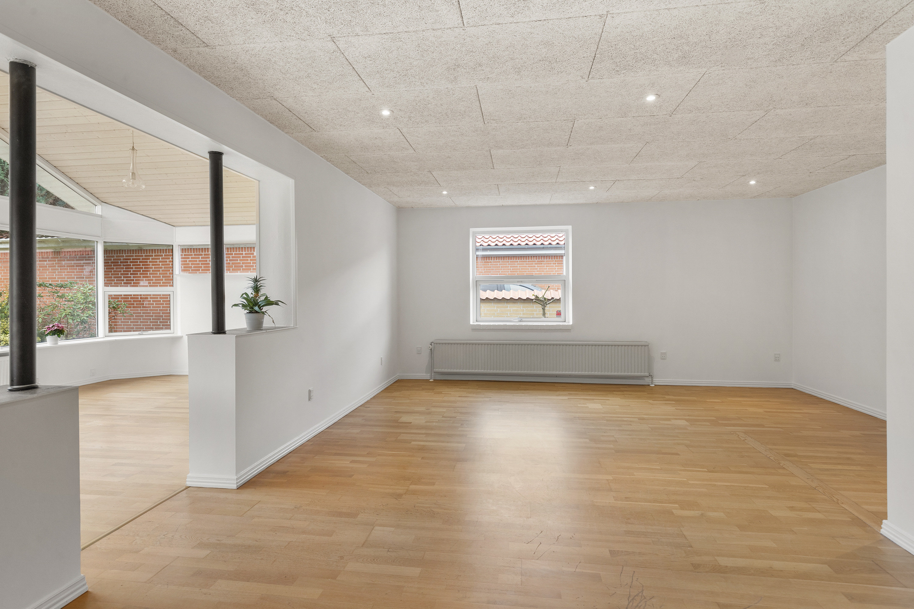 Fremhævet stue billede i fuldskærmstilstand. Billede af Vintervænget 8, 9700 Brønderslev