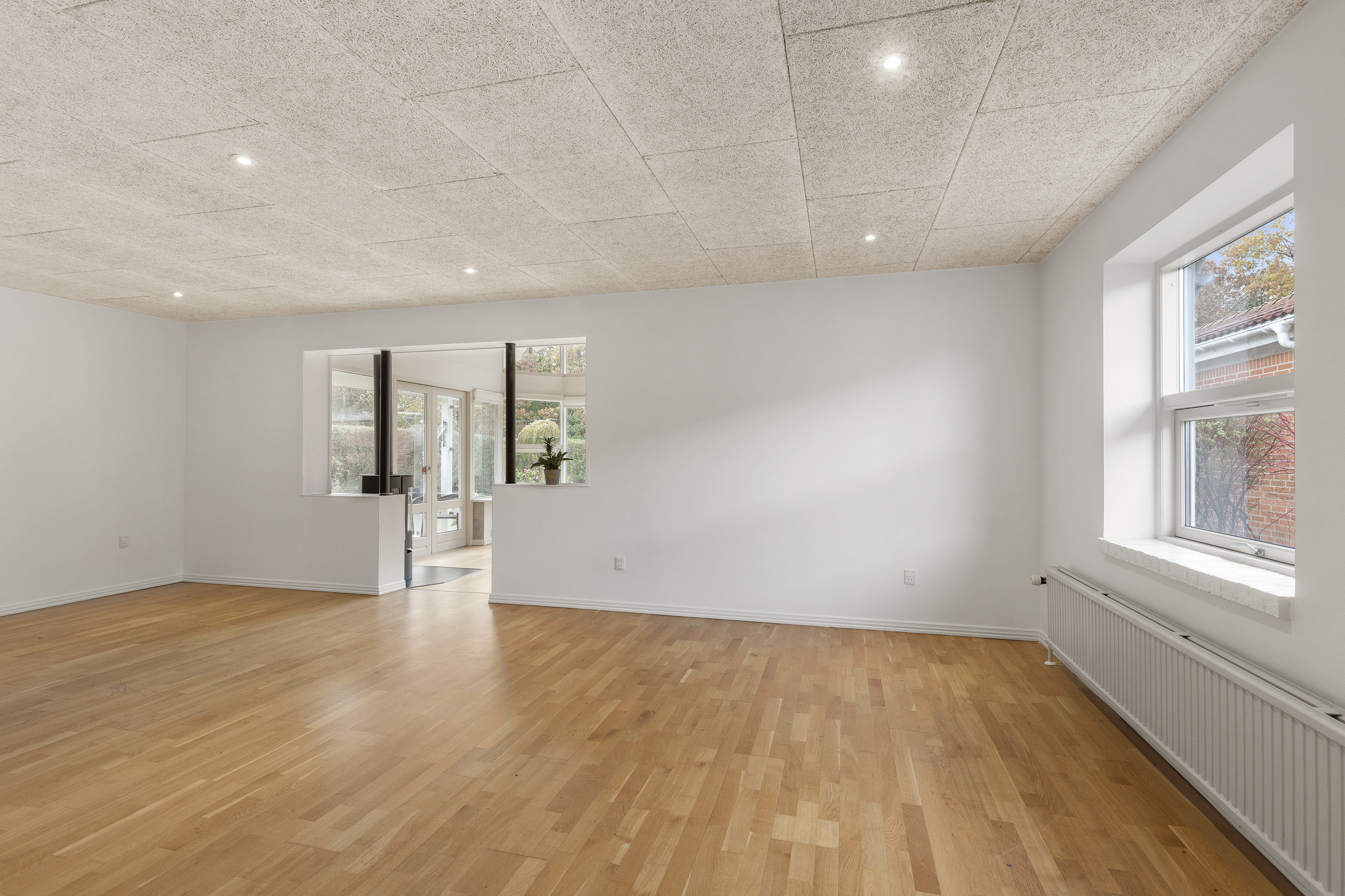 Fremhævet stue billede i fuldskærmstilstand. Billede af Vintervænget 8, 9700 Brønderslev