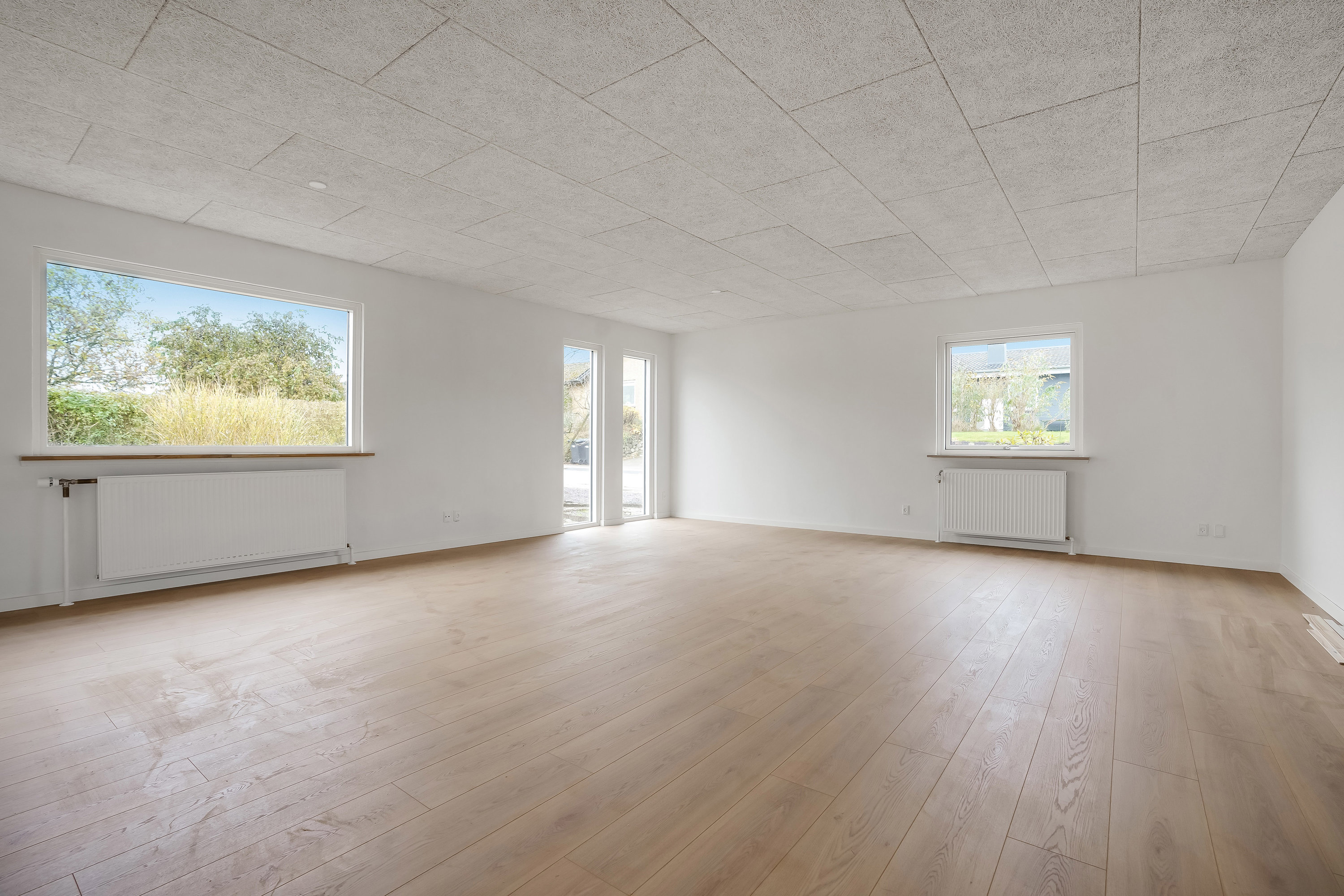 Fremhævet stue billede i fuldskærmstilstand. Billede af Gammelgårdsvej 3, 7321 Gadbjerg